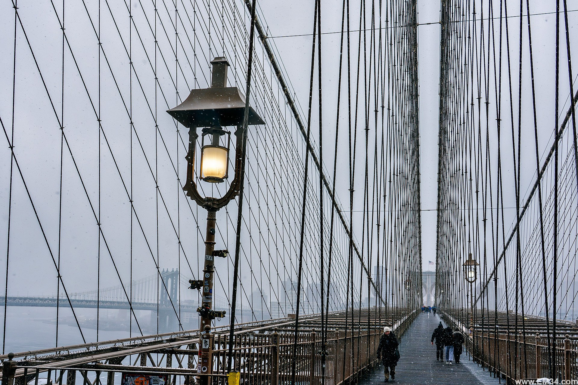 Manhattan Snowfall Street Photography — Wall Street to Brooklyn Bridge, Quiet Winter Mood Before NYC Snowstorm. Emin Kuliyev — Award-Winning Wedding Photojournalist NYC & USA | Best Wedding Photographer Known for Candid, Timeless Moments