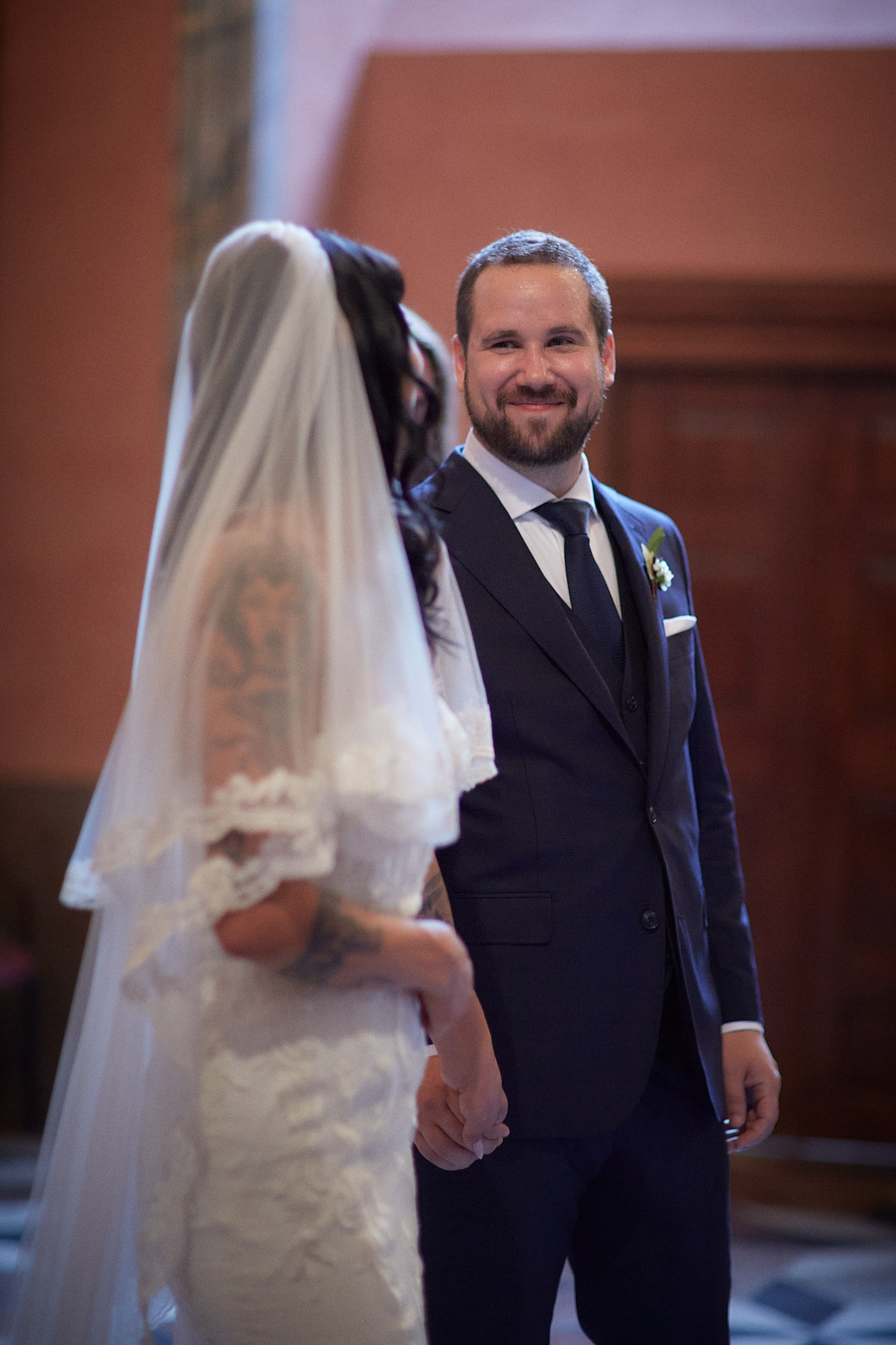 Couple exchanging intimate glances during Mirror Chapel vows