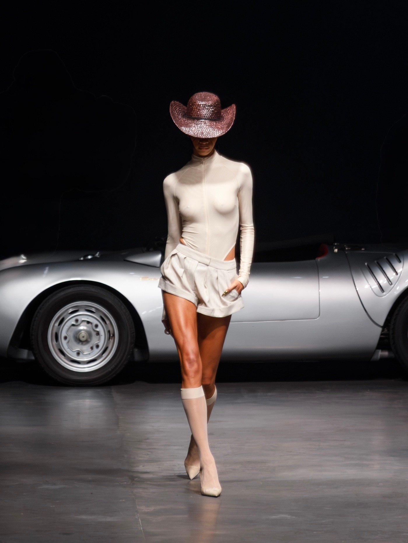 Runway model in beige mini dress – fashion show NYC