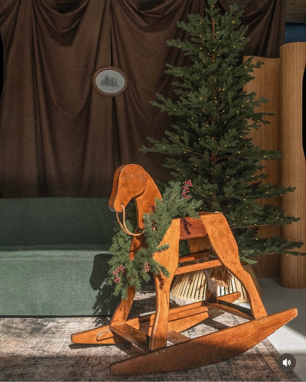Family holiday portraits — parents with little one near the Christmas tree, natural connection and joy.