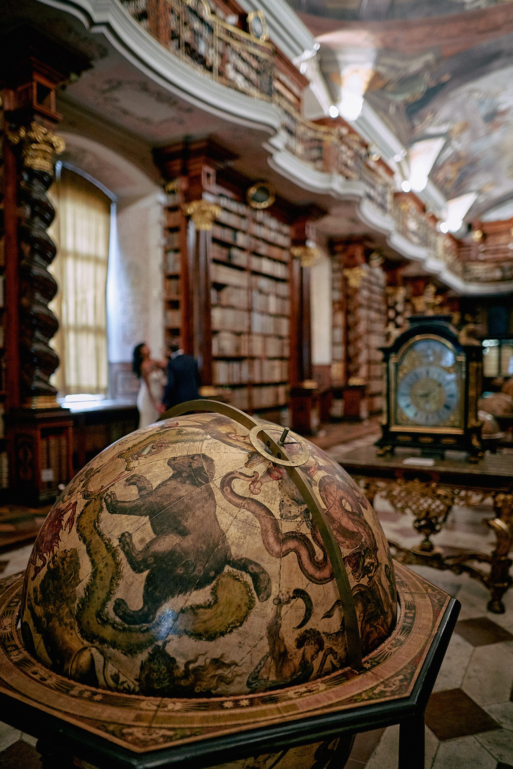 Exclusive wedding photography session in restricted Klementinum Baroque Library.