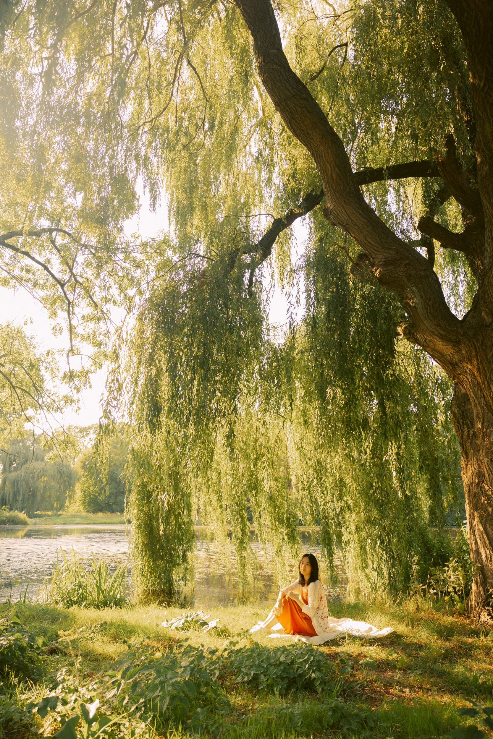 Red Dress Photoshoot in Kralingse Bos, Rotterdam — Portraits by the Lake. Romantic & Soulful Photography by Natalia Olhova in Rotterdam