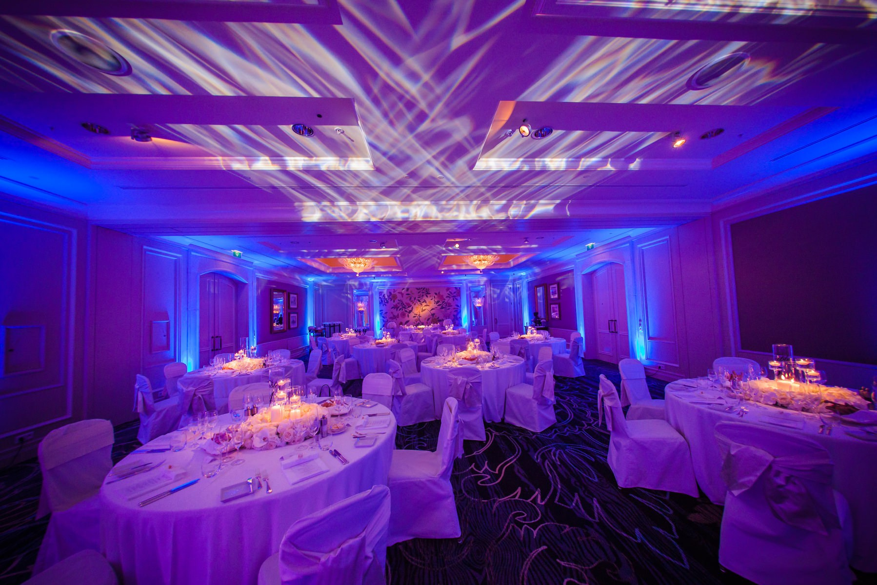 Elegant purple and blue lighting candlelit reception hall Four Seasons Prague