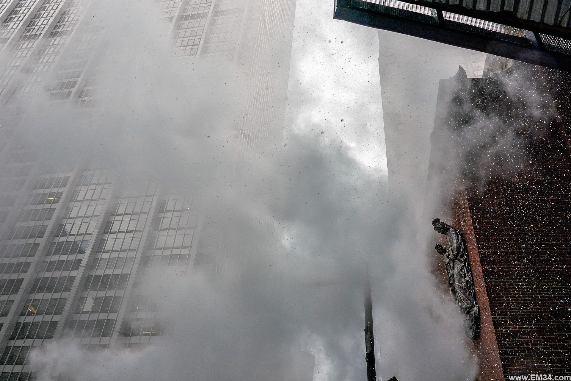 Manhattan Snowfall Street Photography — Wall Street to Brooklyn Bridge, Quiet Winter Mood Before NYC Snowstorm. Emin Kuliyev — Award-Winning Wedding Photojournalist NYC & USA | Best Wedding Photographer Known for Candid, Timeless Moments