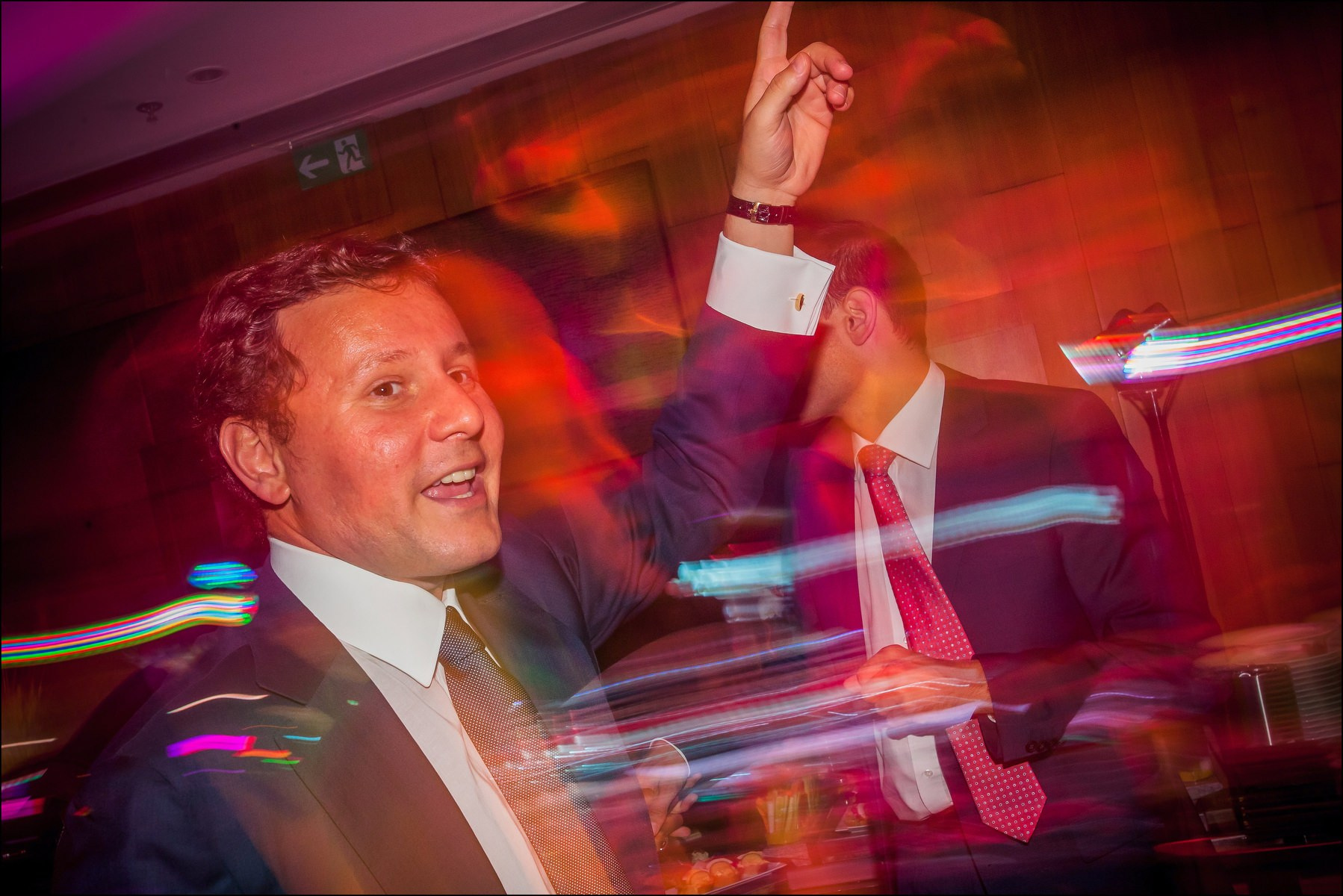 Party guests moving to music Cloud 9 Sky Bar Prague celebration