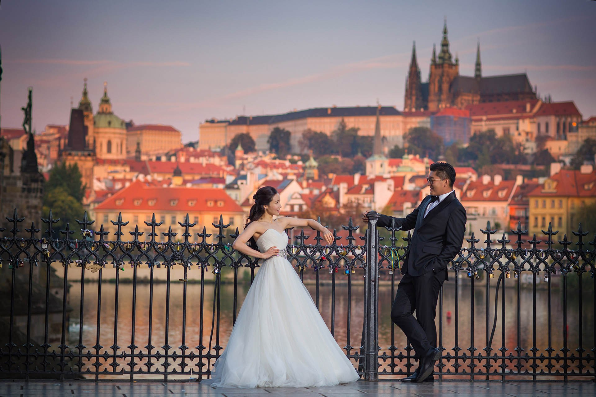 Catherine playful Prague Castle sunrise Cedric Son attention wedding portrait.