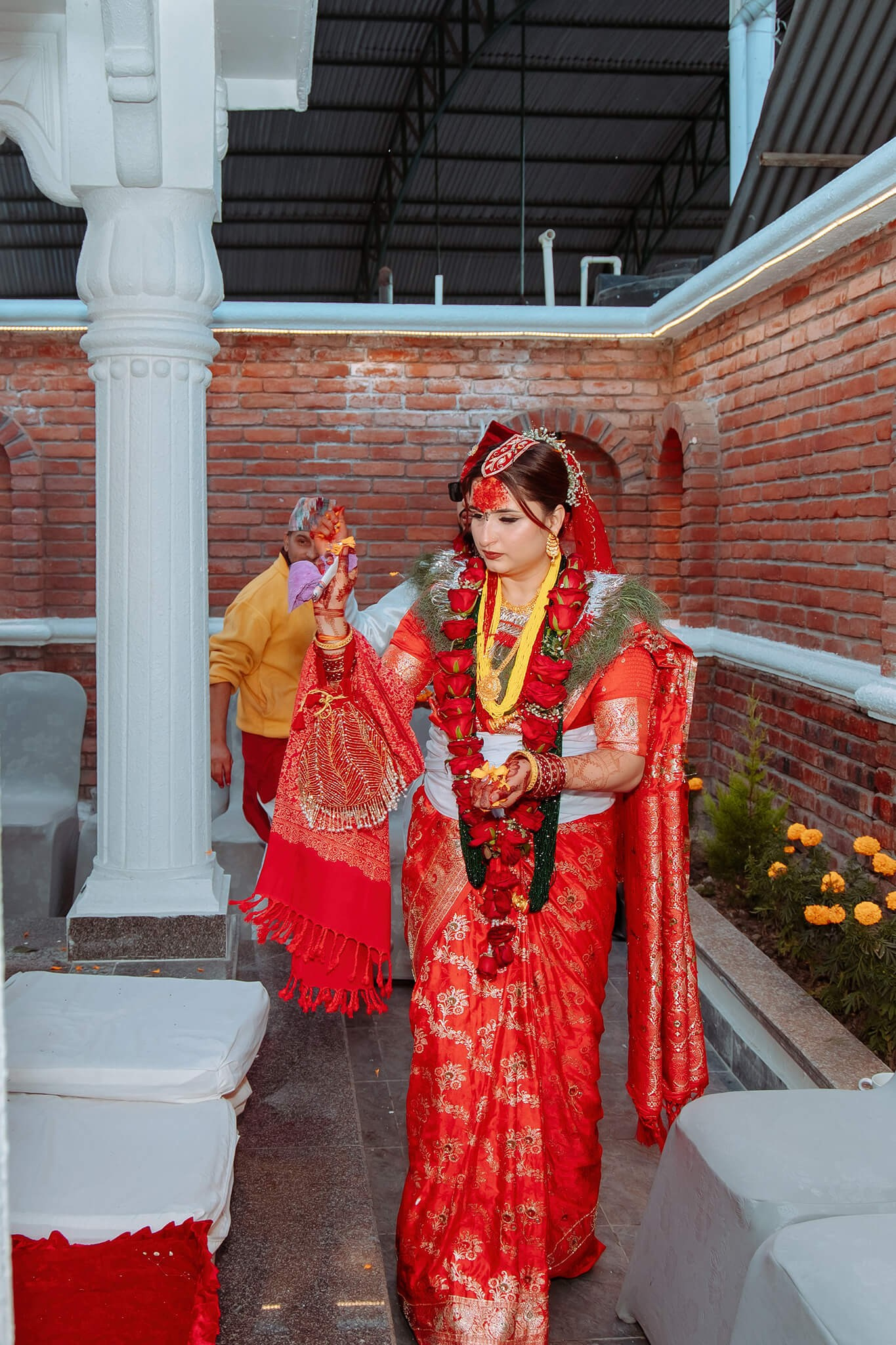 Bride walking during a traditional Hindu wedding ceremony in Nepal.