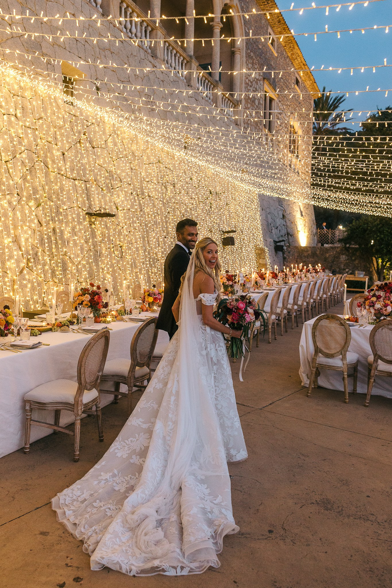 American couple exchanging vows with wedding officiant Son Marroig