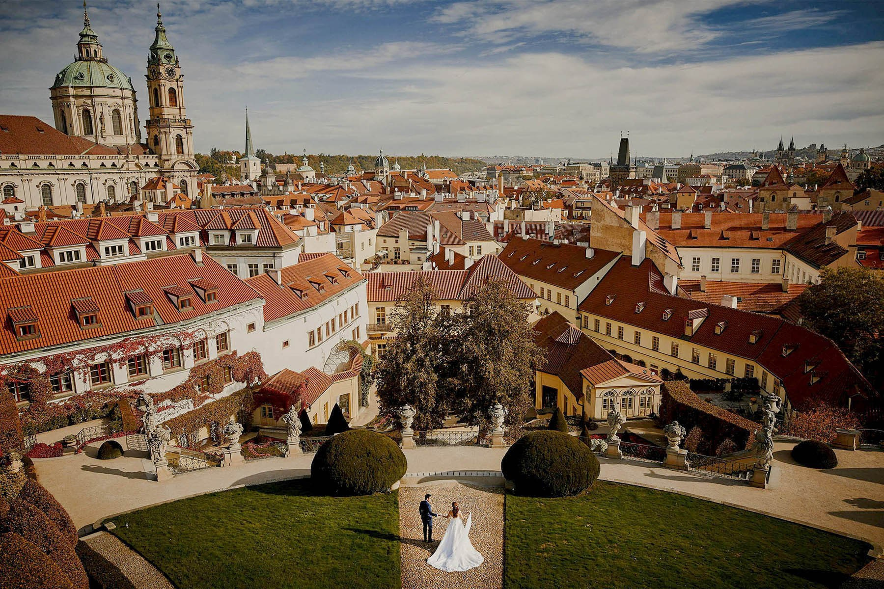Aerial view of a couple walking in Baroque Vrtba Garden, Prague