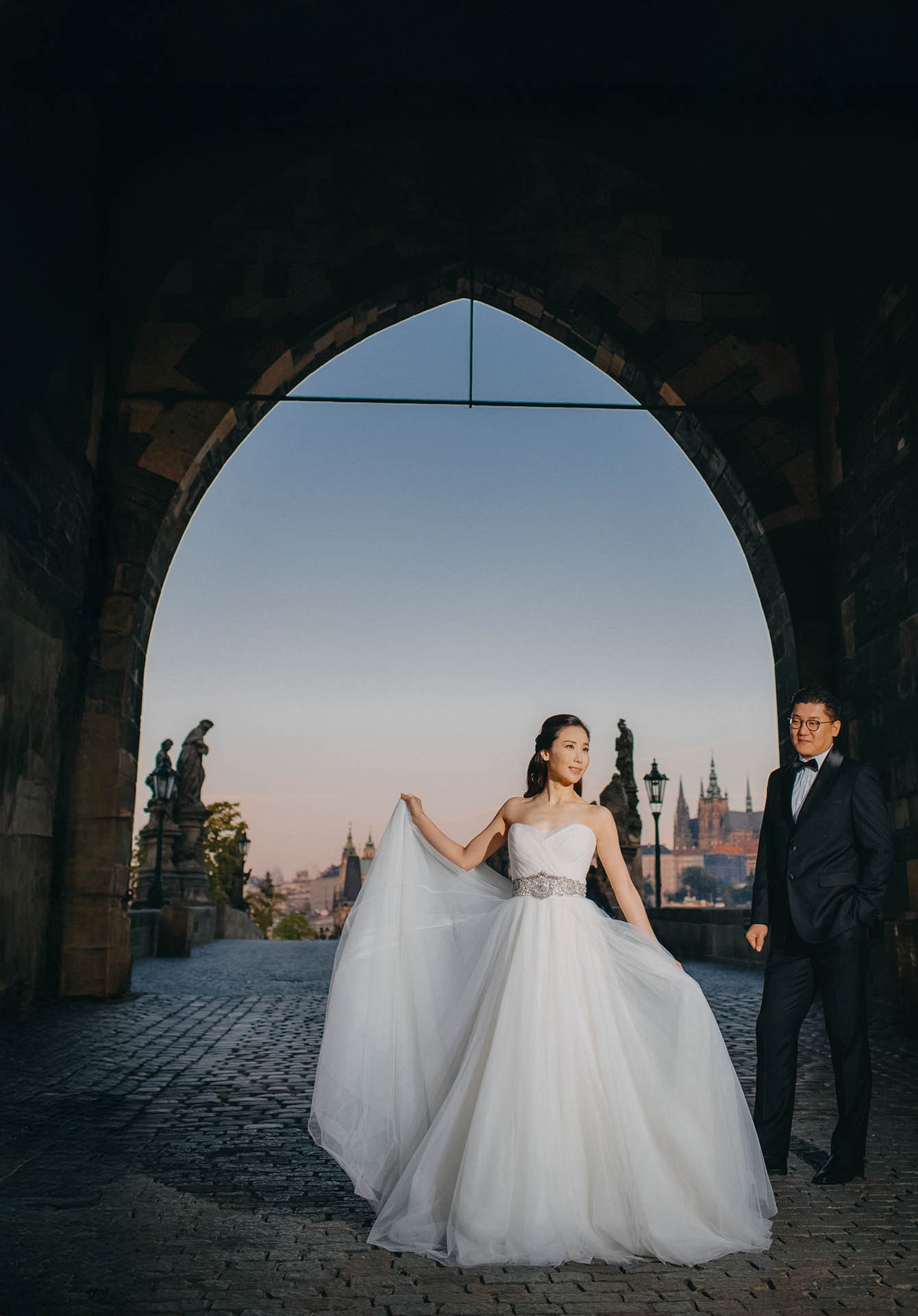 Catherine designer dress gothic tower Charles Bridge Cedric Son Prague portrait.