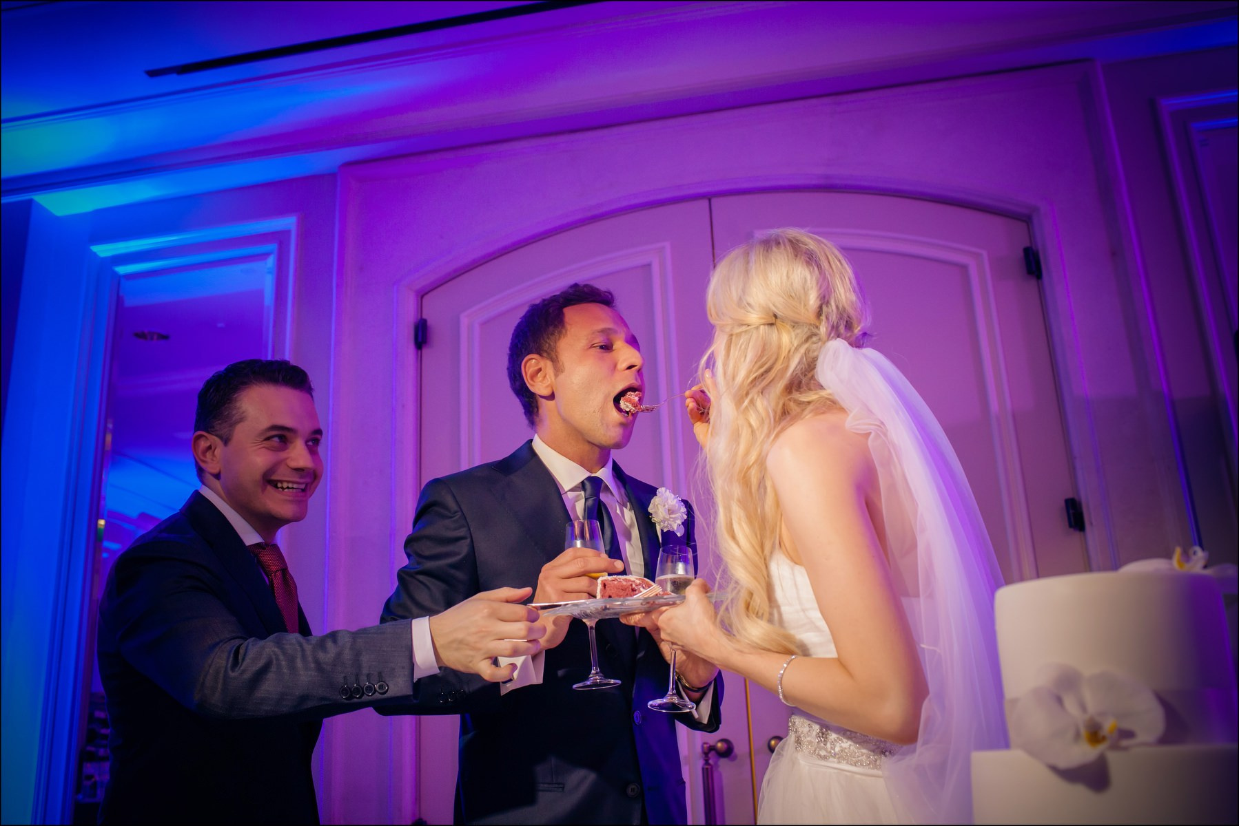 Bride feeding groom first cake bite wedding tradition Prague
