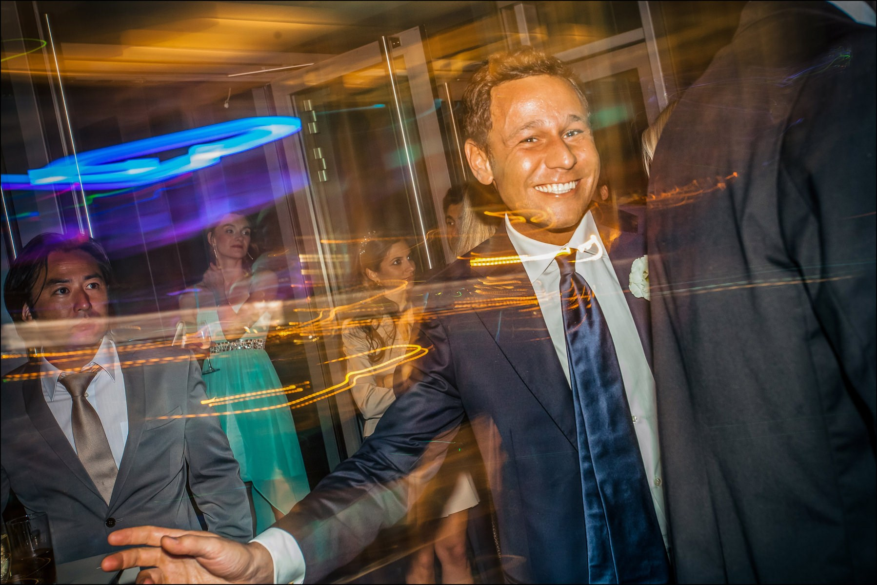 Groom welcoming guests Sky Bar afterparty Prague wedding