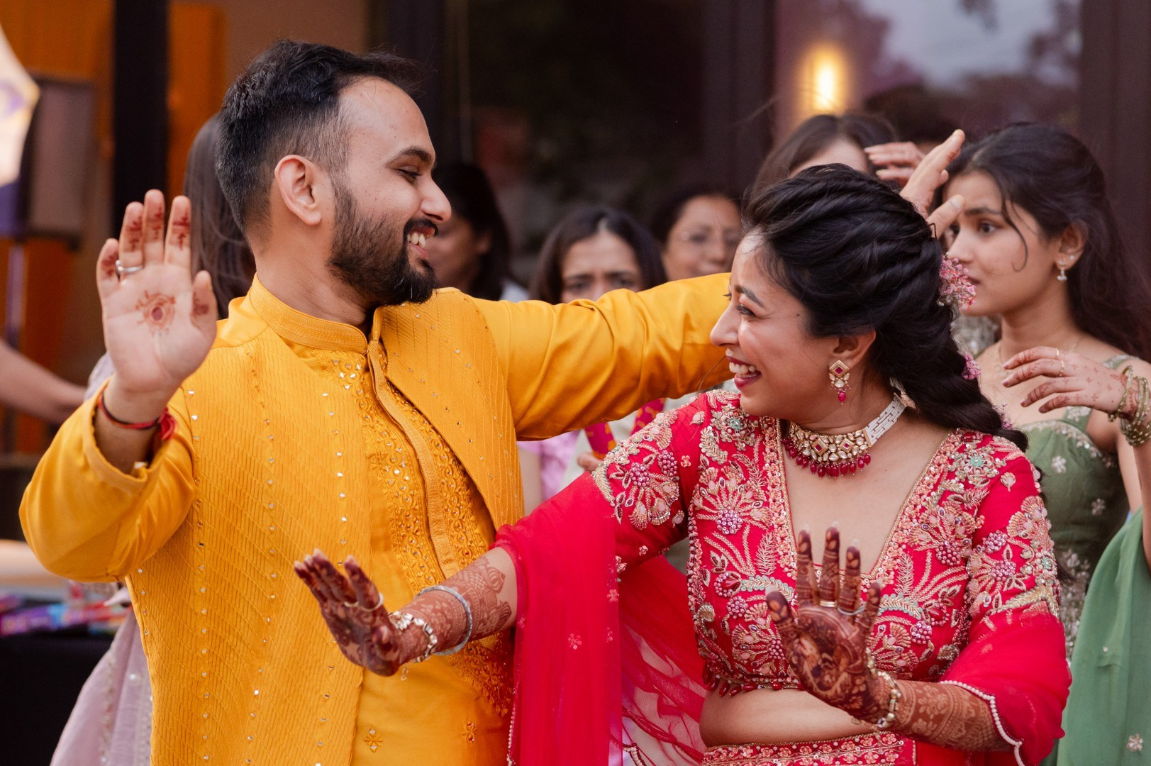 Hands in the Air: Chiranjeev & Niharika at Hyatt Centric Hebbal. Truly Yours | Documentary Wedding Photography & Films | Sharath Padaru, Bangalore