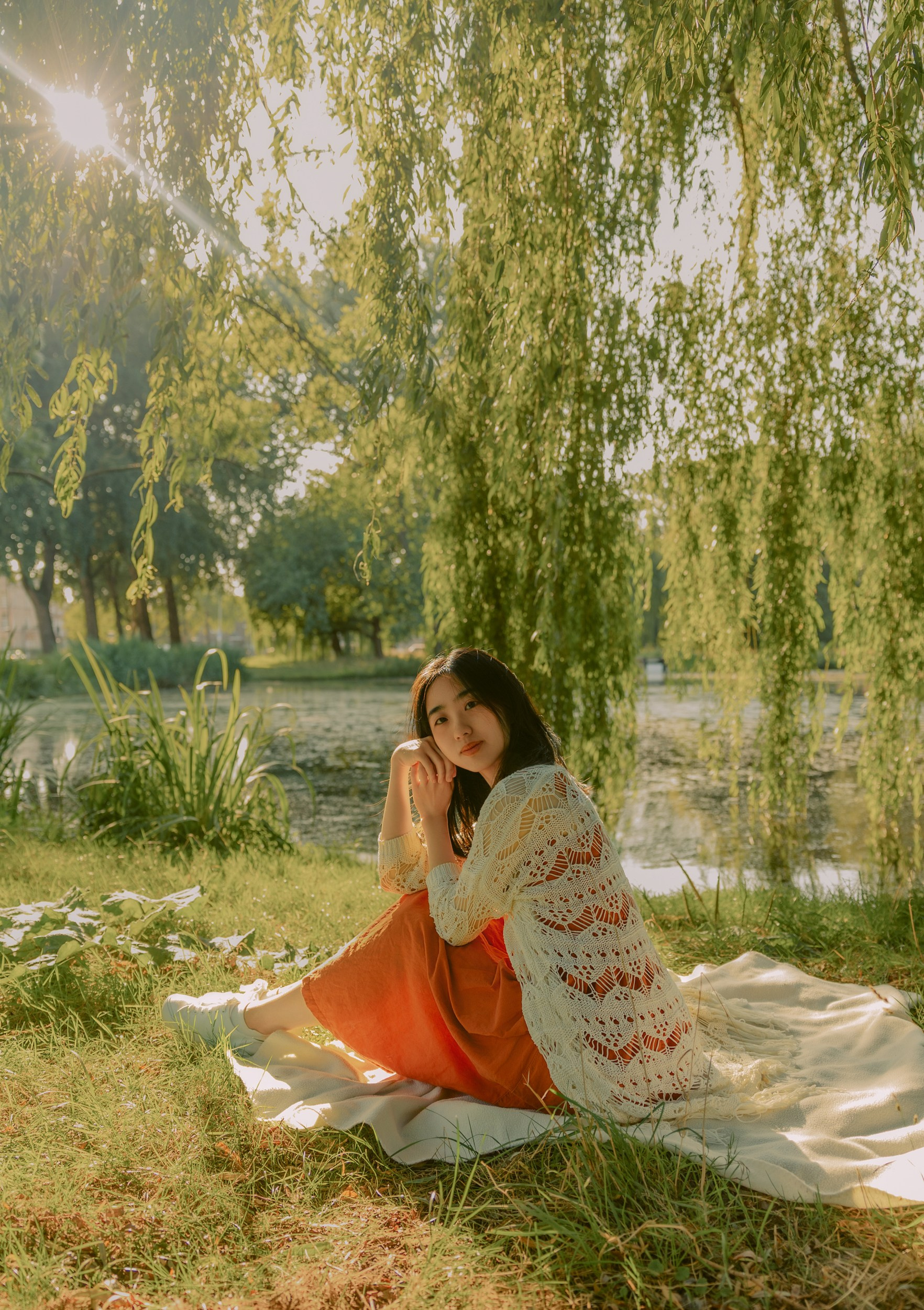 Red Dress Photoshoot in Kralingse Bos, Rotterdam — Portraits by the Lake. Romantic & Soulful Photography by Natalia Olhova in Rotterdam