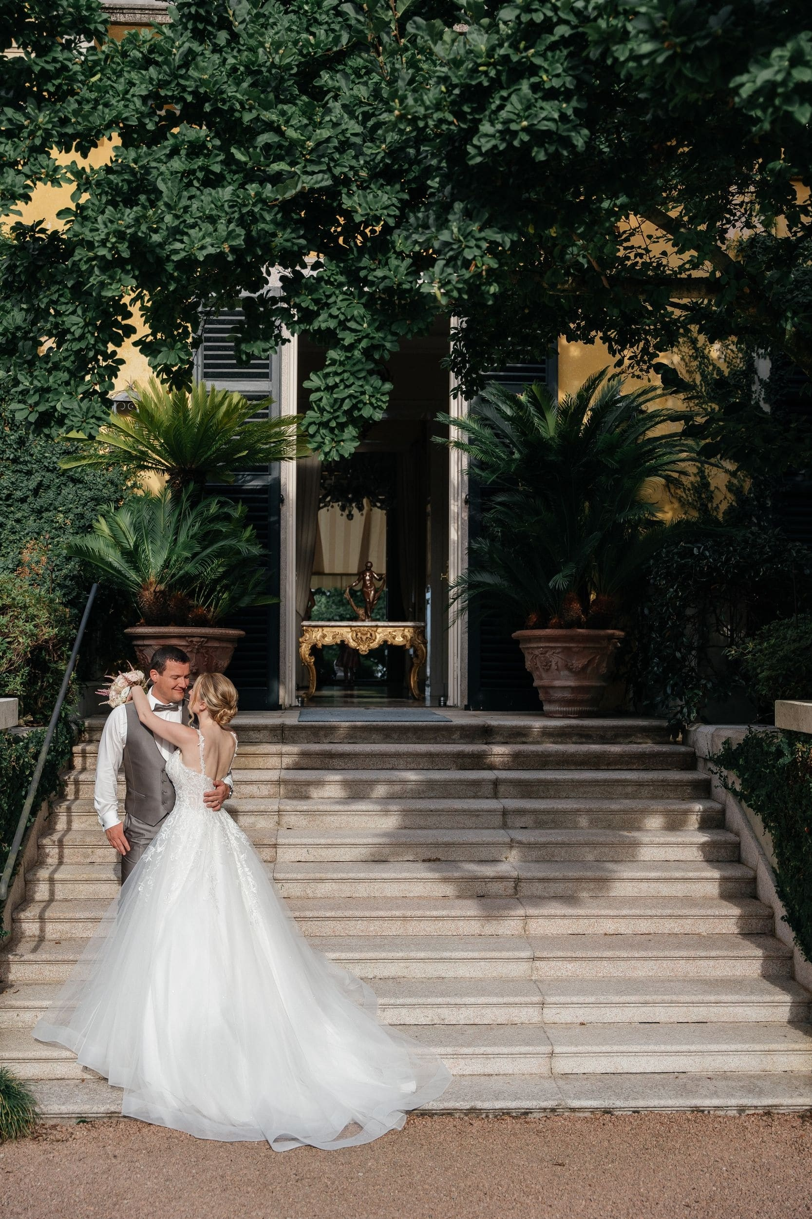 couple with beautiful villa at lake maggiore