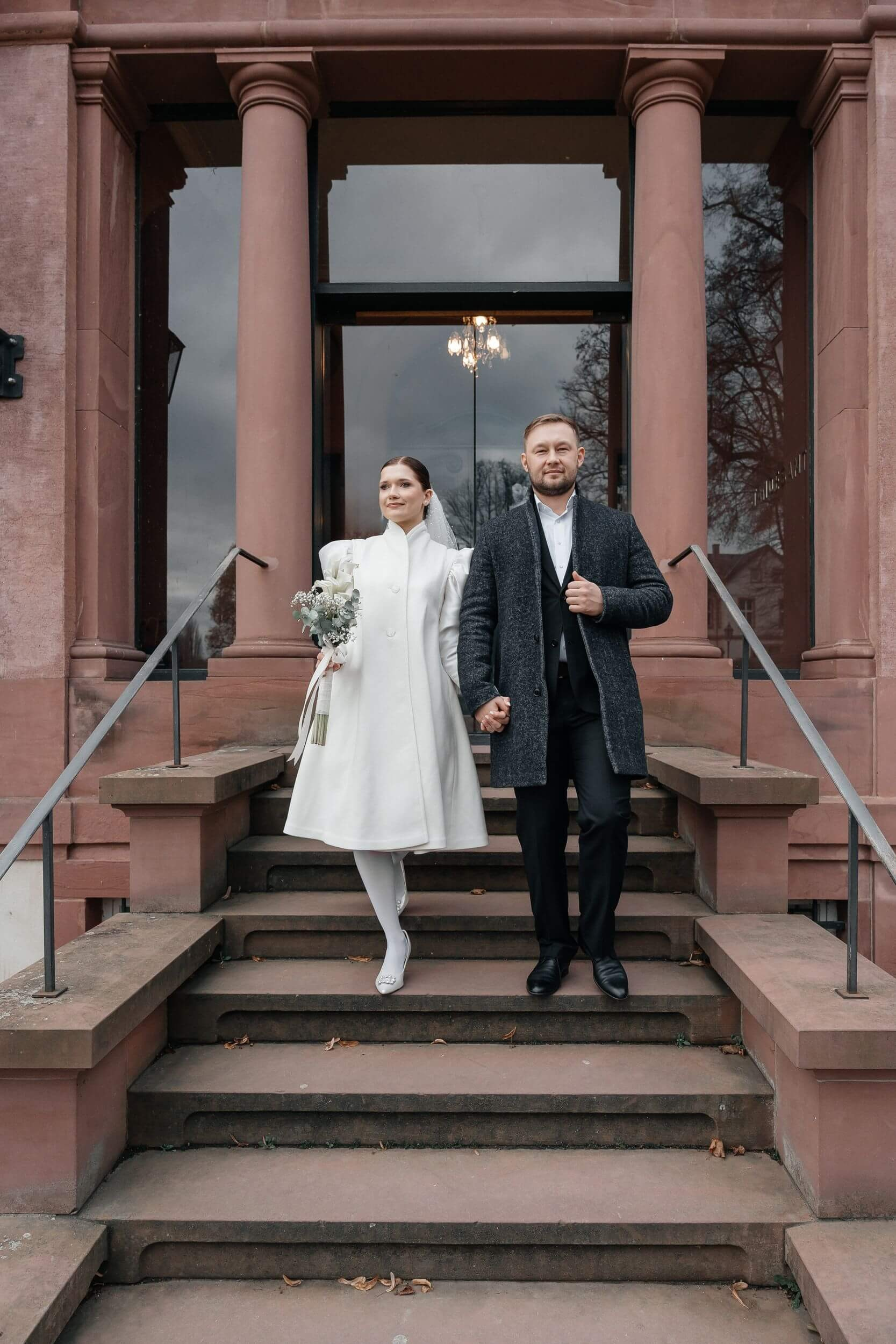 couple at the stairs of bolongaropalast