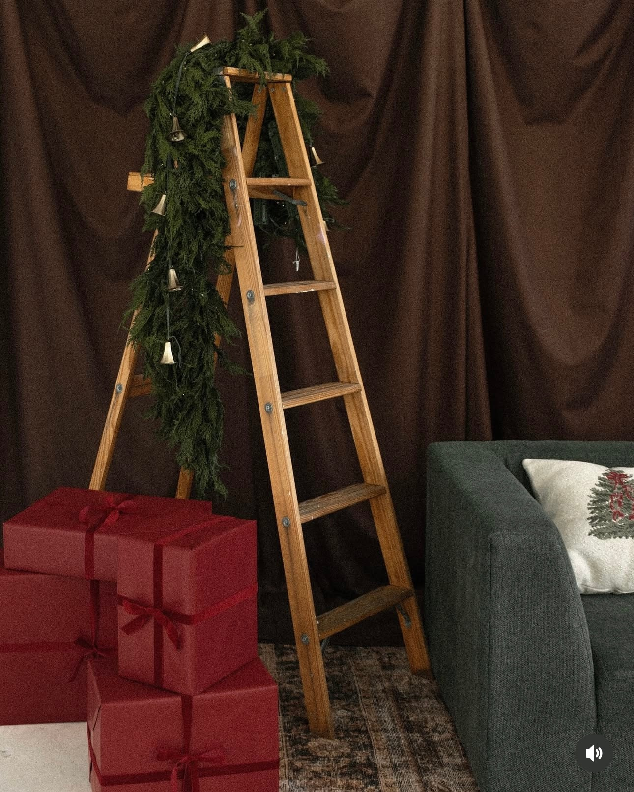 Couple’s Christmas photoshoot — intimate, warm moments captured under golden lights.