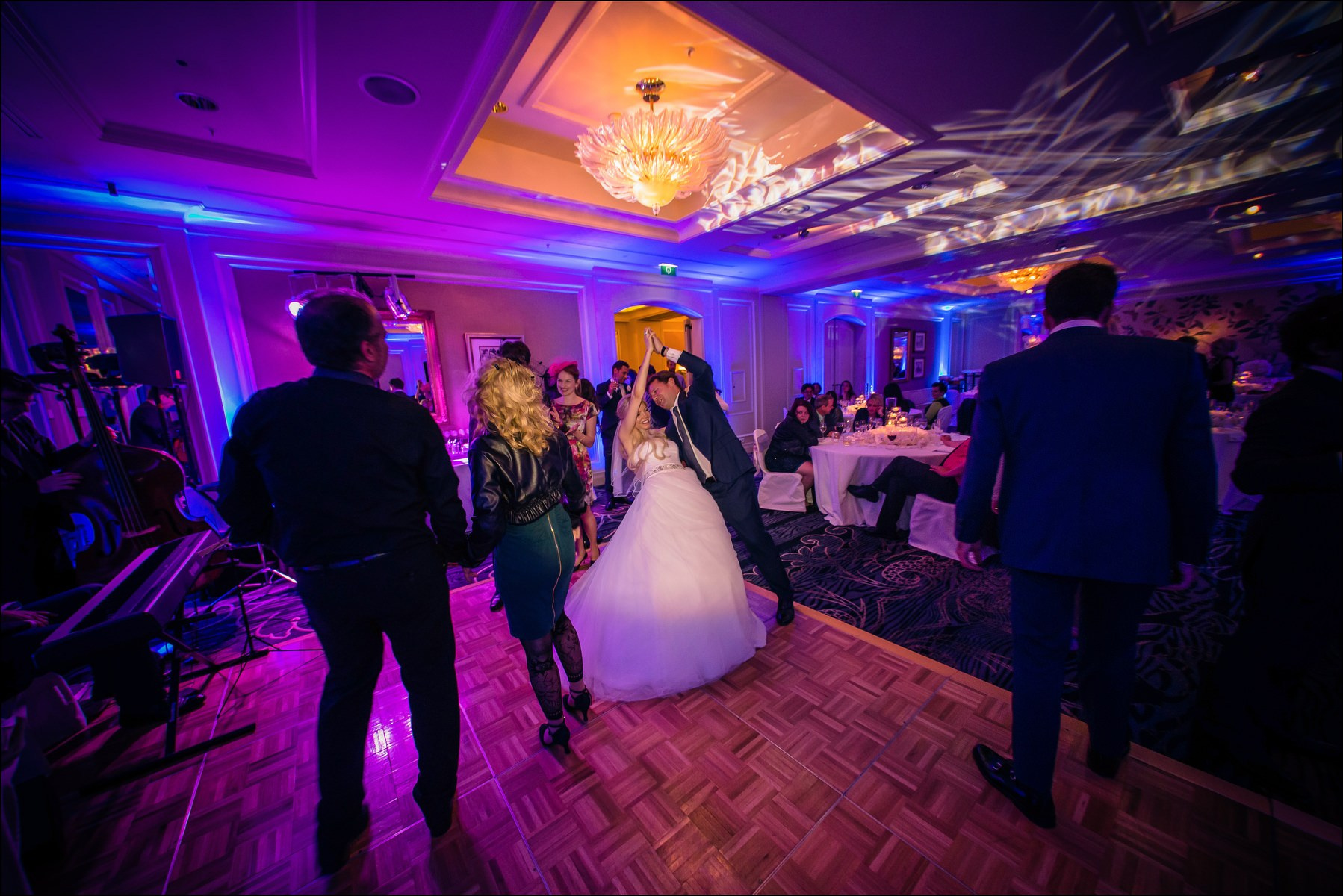 Bride being dipped during dancing Four Seasons Prague wedding party