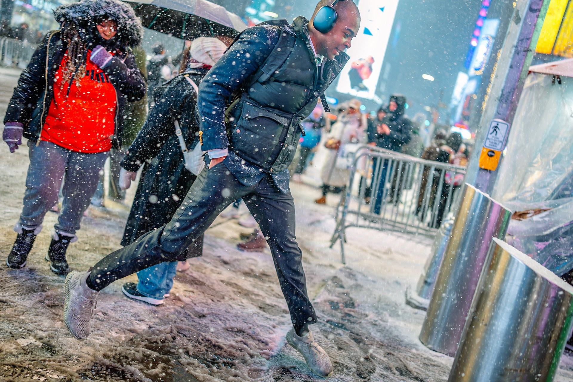 New York City Snowfall Street Photography — Night Winter Scenes Capturing Emotions, Reactions & Euphoria of Falling Snow. Emin Kuliyev — Award-Winning Wedding Photojournalist NYC & USA | Best Wedding Photographer Known for Candid, Timeless Moments