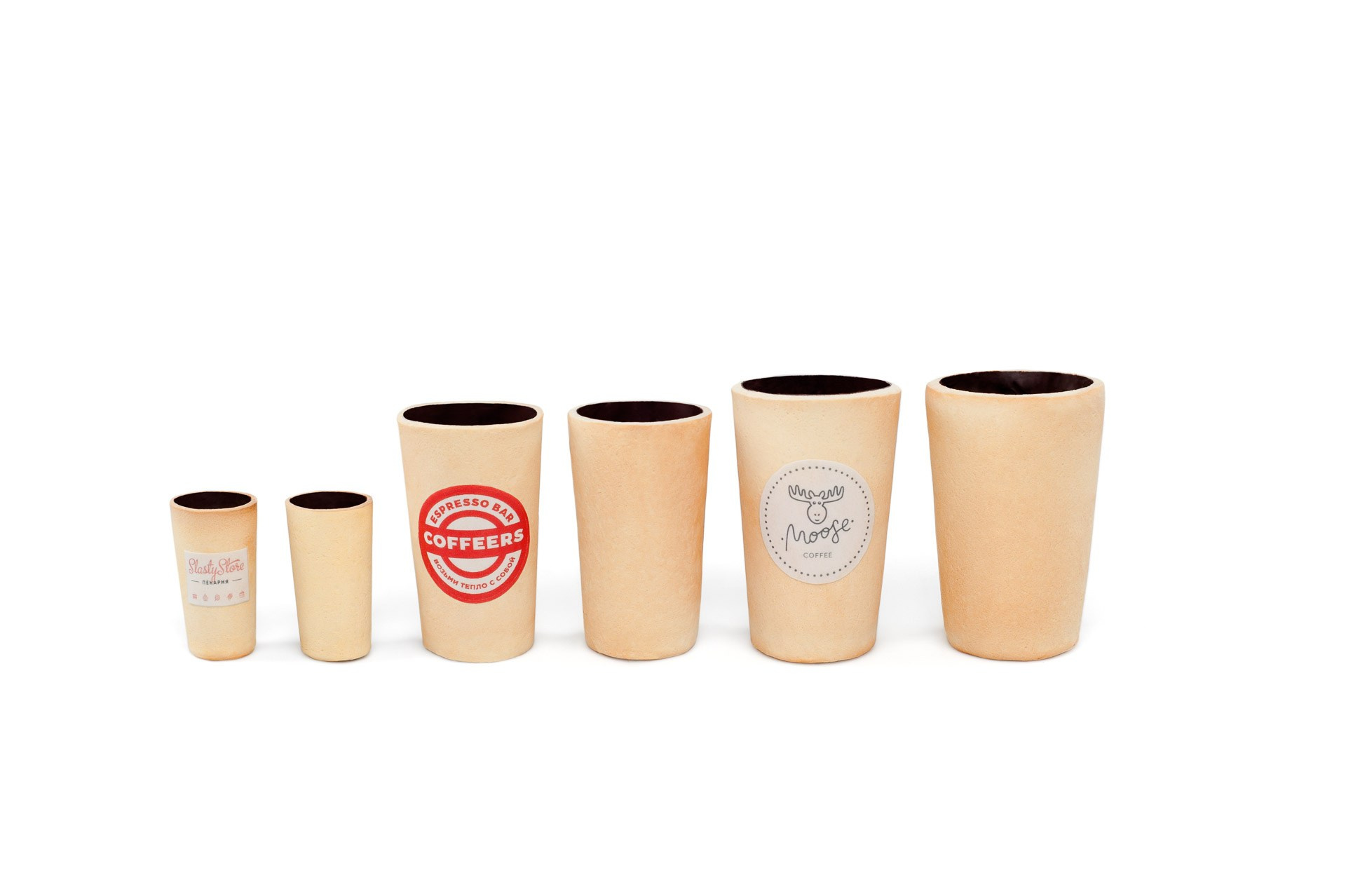 Product photography of eco-friendly paper cups on white background for branding and packaging design