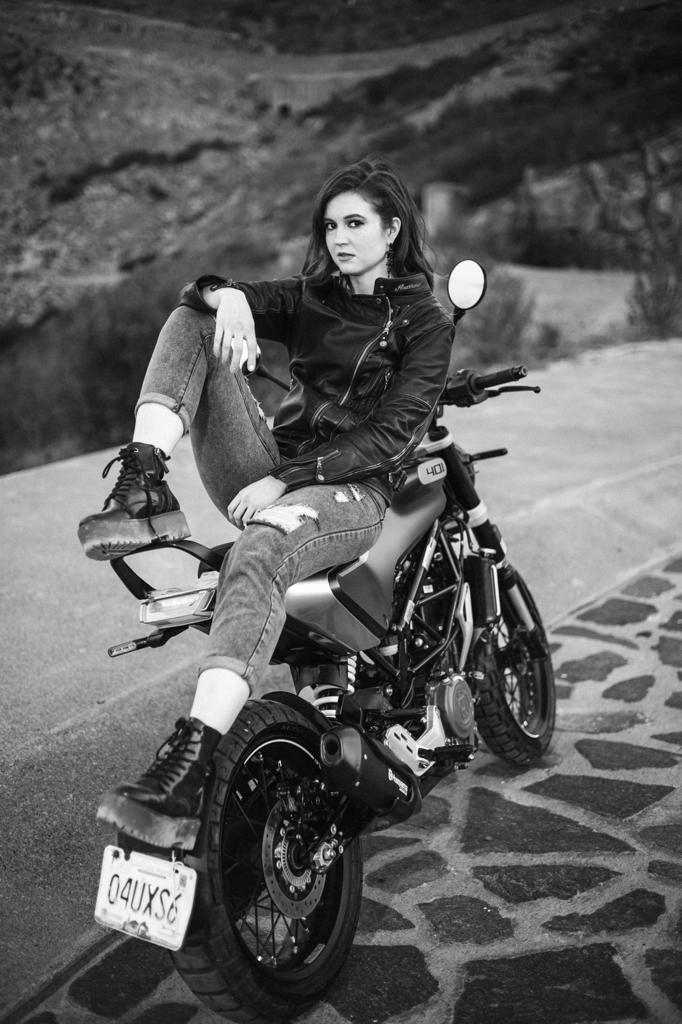 Girl on a motorcycle bw photo
