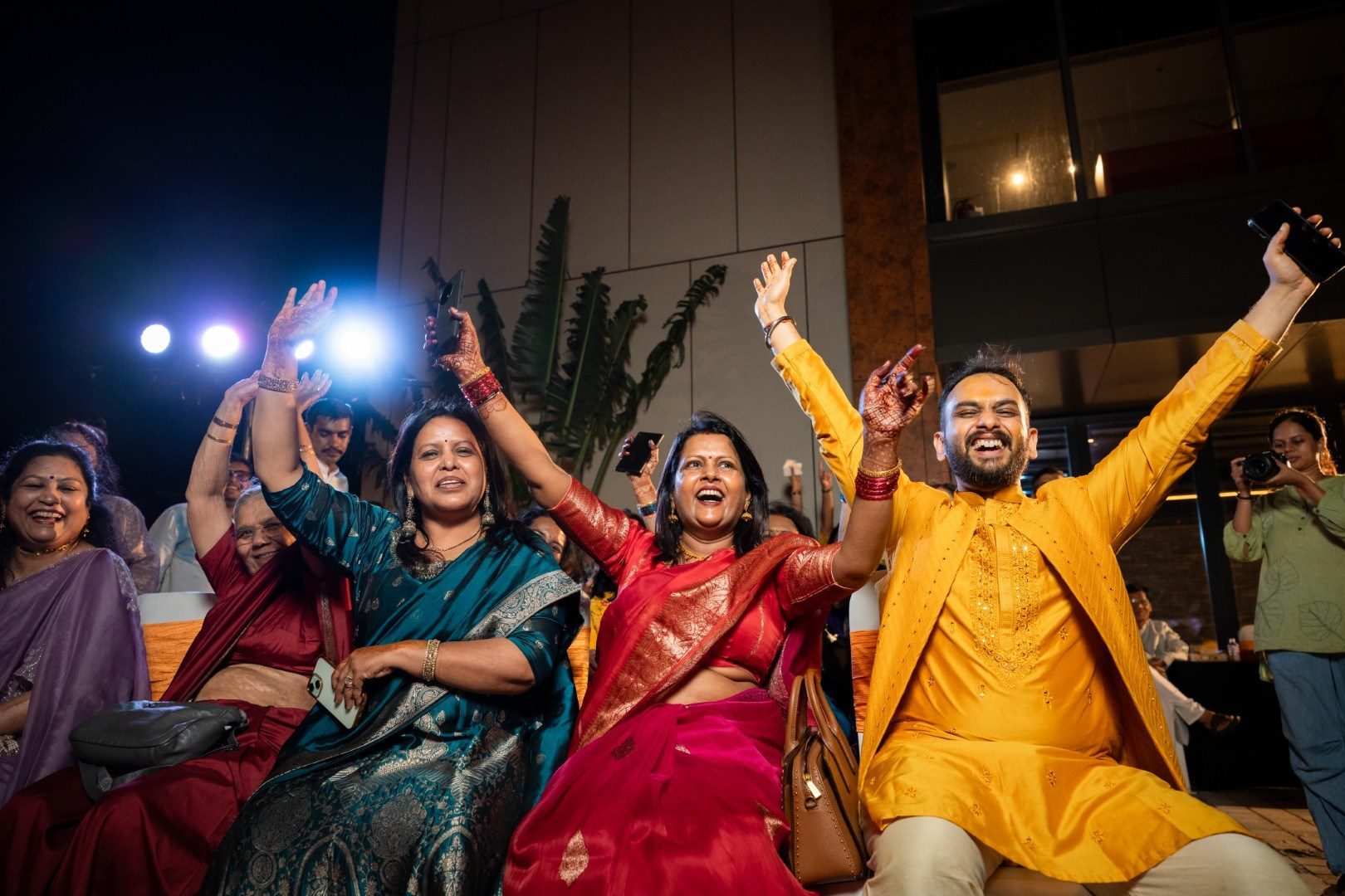 Hands in the Air: Chiranjeev & Niharika at Hyatt Centric Hebbal. Truly Yours | Documentary Wedding Photography & Films | Sharath Padaru, Bangalore