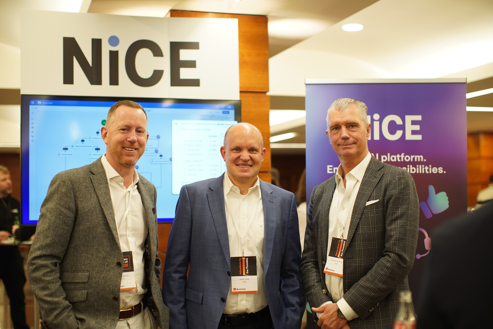 Exhibition partners group photo in trade hall during Orange Business European Sales Kick-Off 2026 at Hilton Prague.