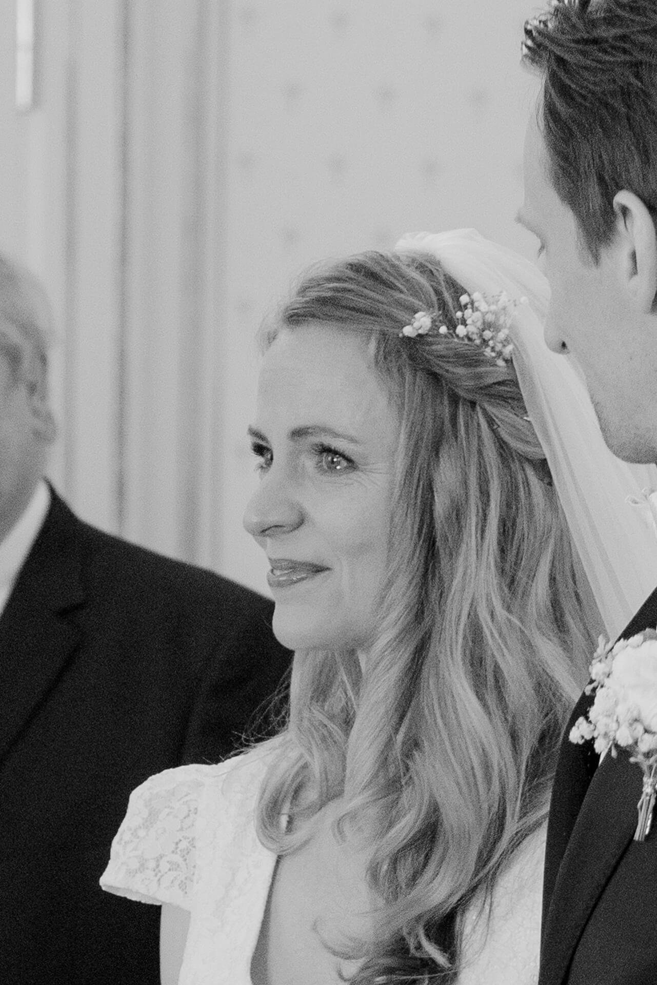 Black and white bridal portrait during ceremony at Falkenstein Grand