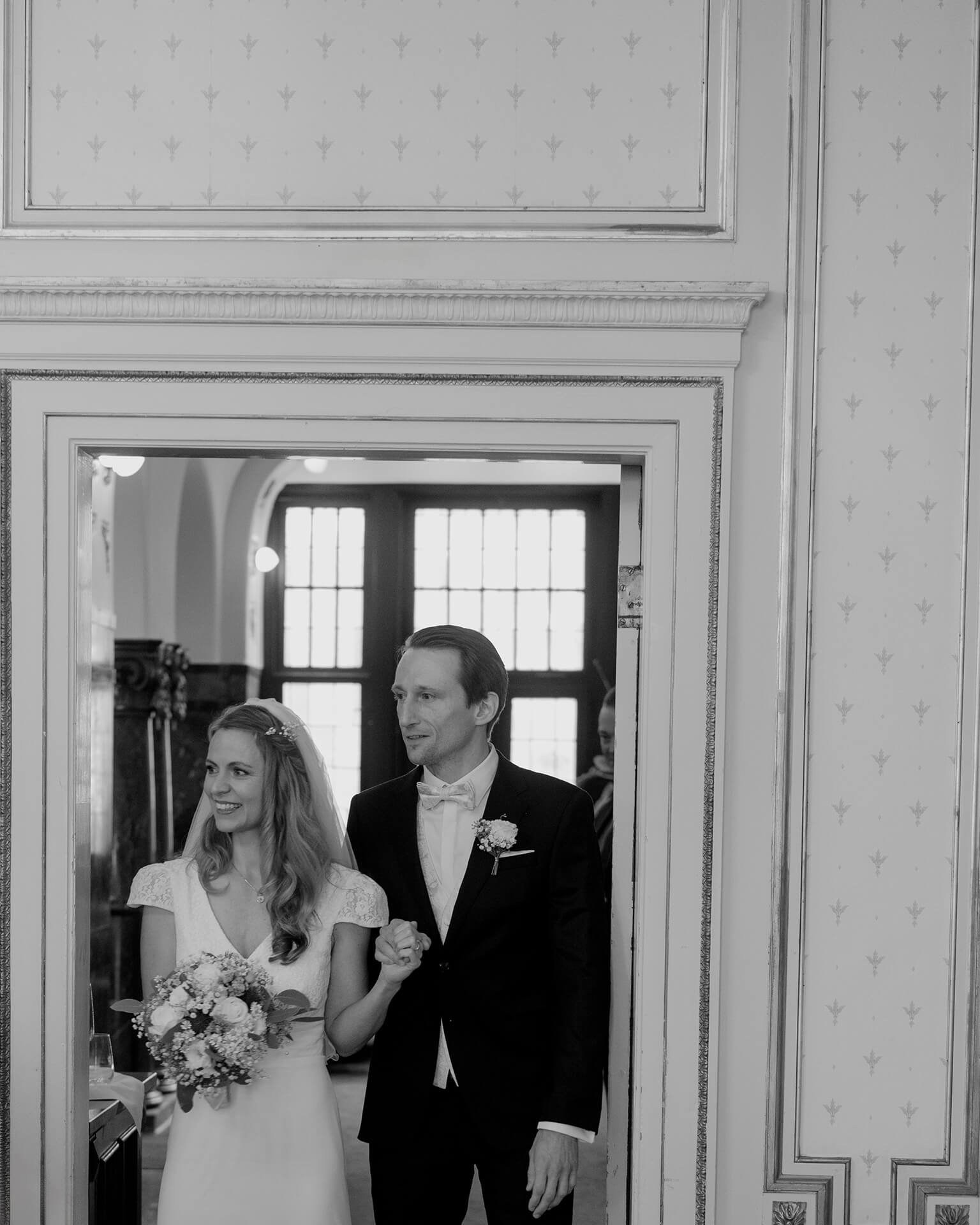 Black and white couple reflected in mirror, Falkenstein Grand wedding