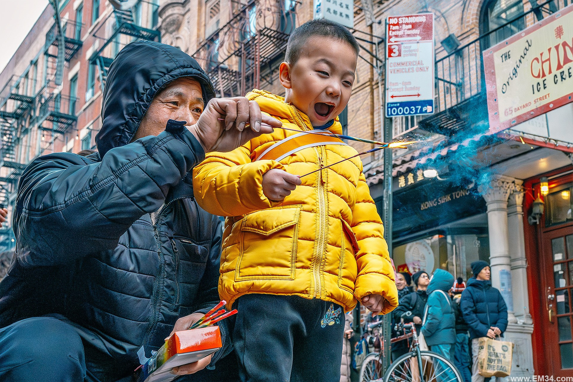 Lunar New Year Chinatown Street Photography — Chaotic NYC Festival Captured in One Hour of Firecrackers, Color & Energy. Emin Kuliyev — Award-Winning Wedding Photojournalist NYC & USA | Best Wedding Photographer Known for Candid, Timeless Moments