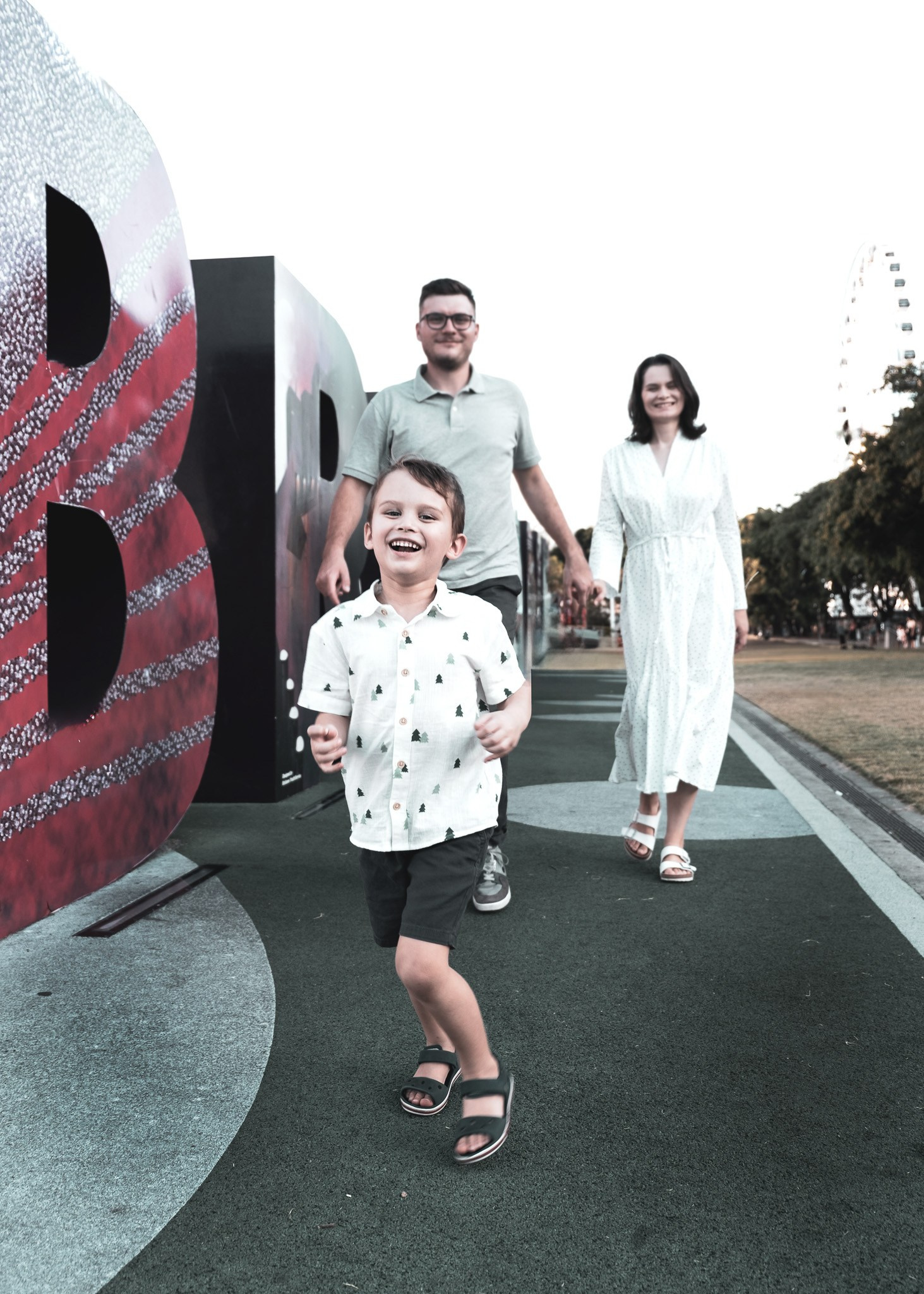 Happy family photo session in Brisbane park, candid lifestyle photography