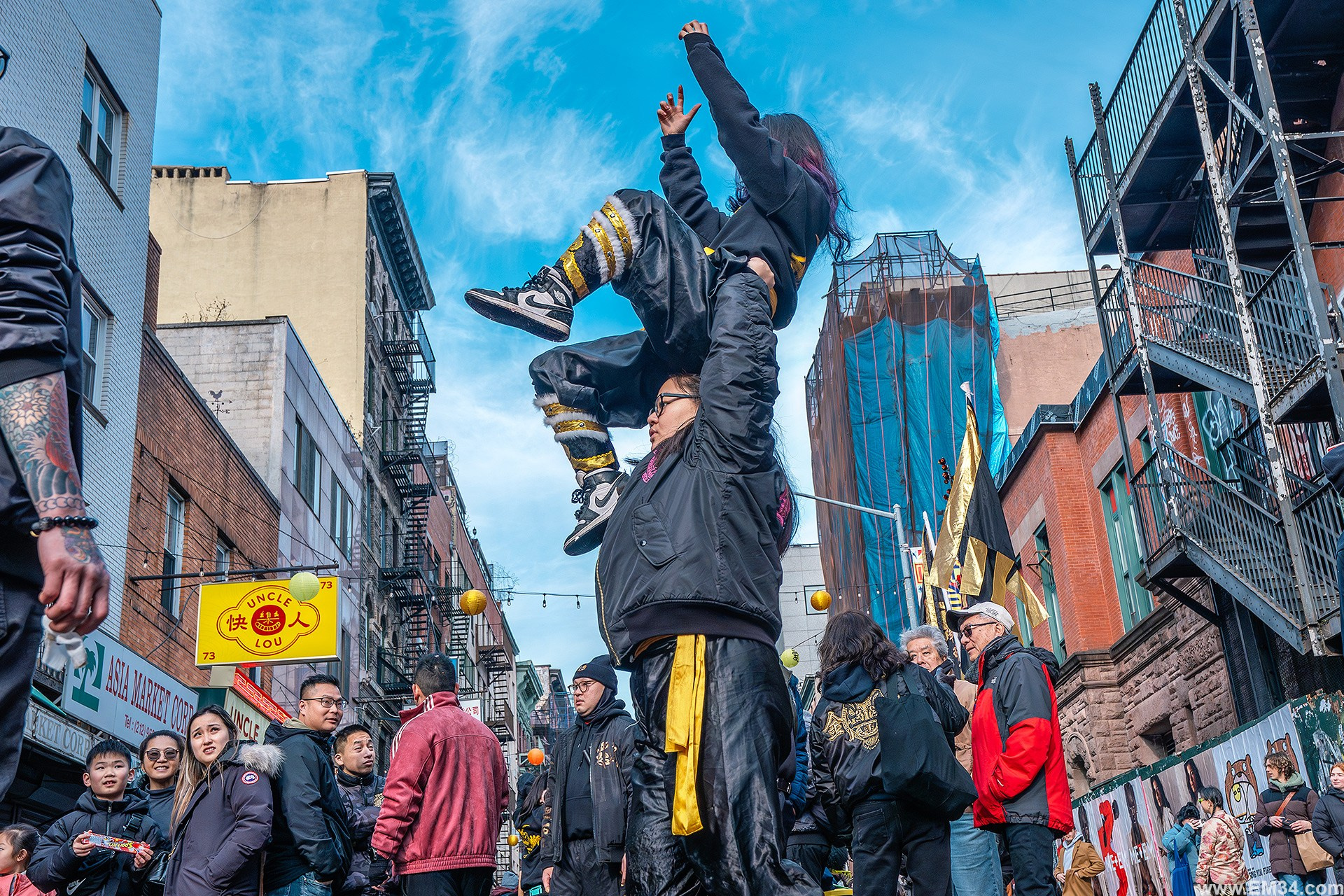 Lunar New Year Chinatown Street Photography — Chaotic NYC Festival Captured in One Hour of Firecrackers, Color & Energy. Emin Kuliyev — Award-Winning Wedding Photojournalist NYC & USA | Best Wedding Photographer Known for Candid, Timeless Moments