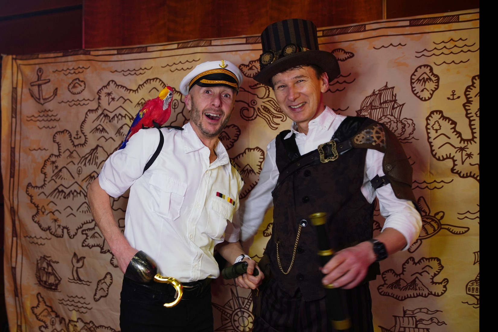 Employees in adventure costumes group pose during Orange Business Sales Kick-Off gala Hilton Prague.