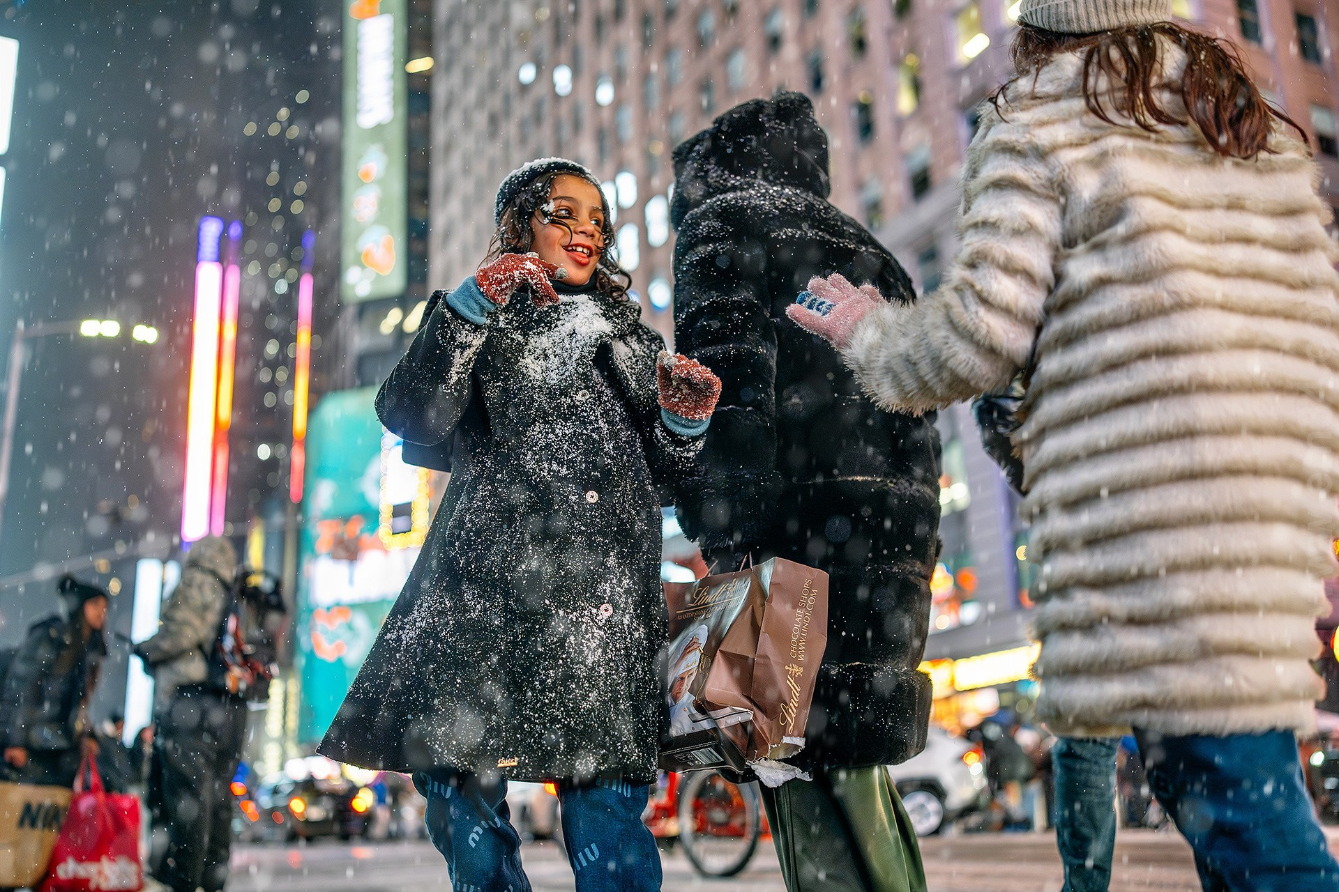 New York City Snowfall Street Photography — Night Winter Scenes Capturing Emotions, Reactions & Euphoria of Falling Snow. Emin Kuliyev — Award-Winning Wedding Photojournalist NYC & USA | Best Wedding Photographer Known for Candid, Timeless Moments
