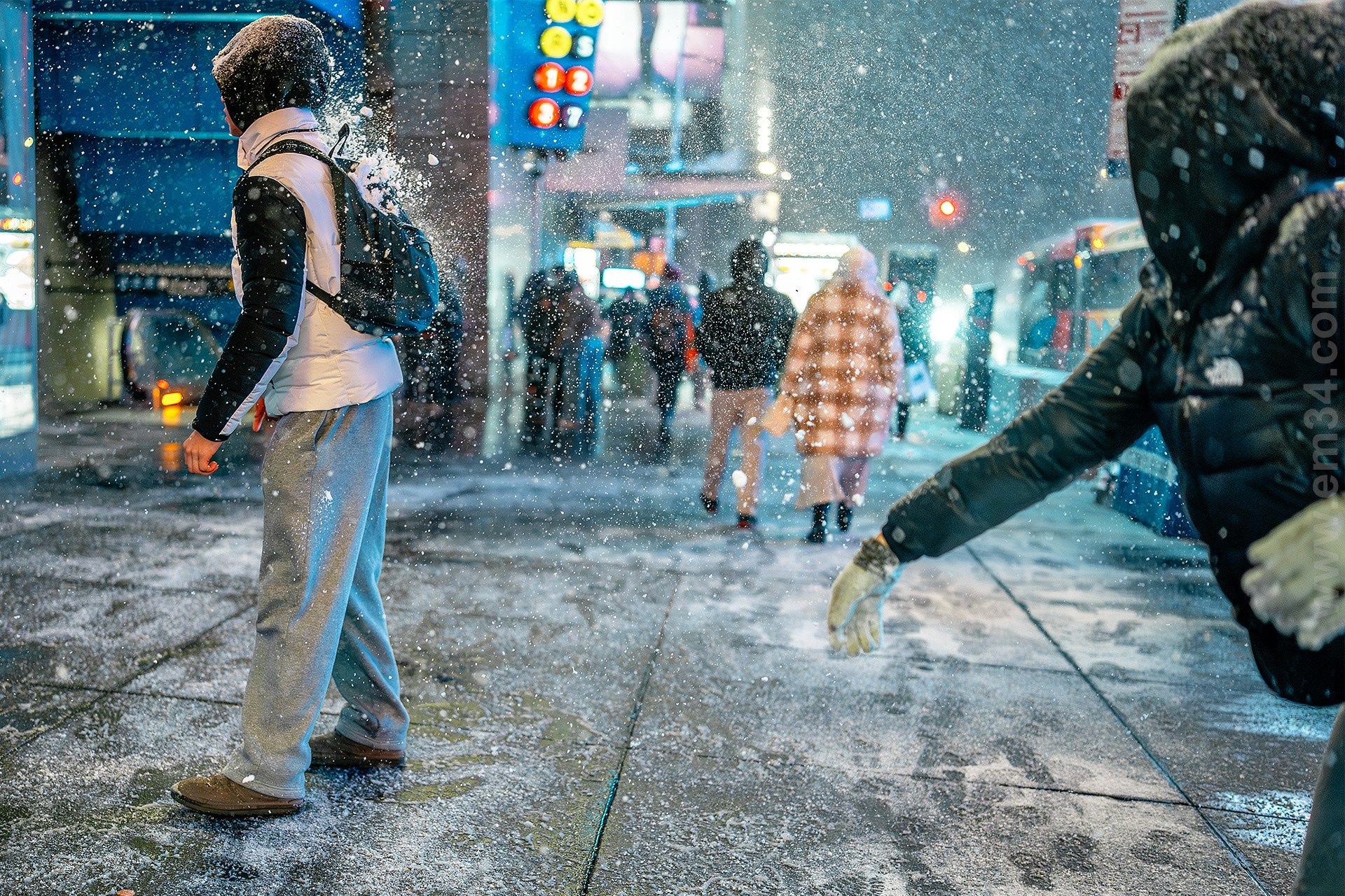 New York City Snowfall Street Photography — Night Winter Scenes Capturing Emotions, Reactions & Euphoria of Falling Snow. Emin Kuliyev — Award-Winning Wedding Photojournalist NYC & USA | Best Wedding Photographer Known for Candid, Timeless Moments