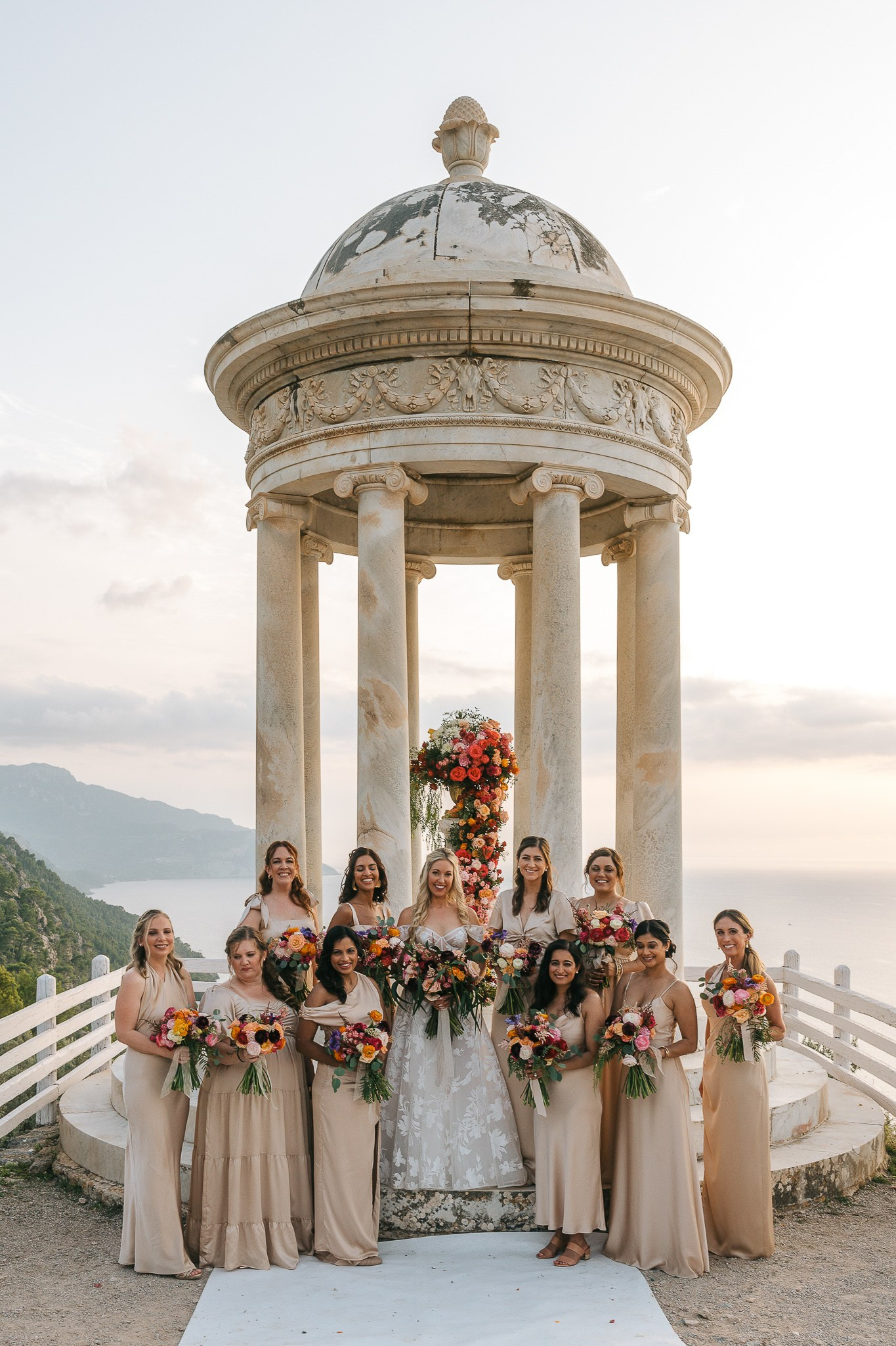 Bride and her bridesmaids posing with bouquets at Son Marroig, Mallorca