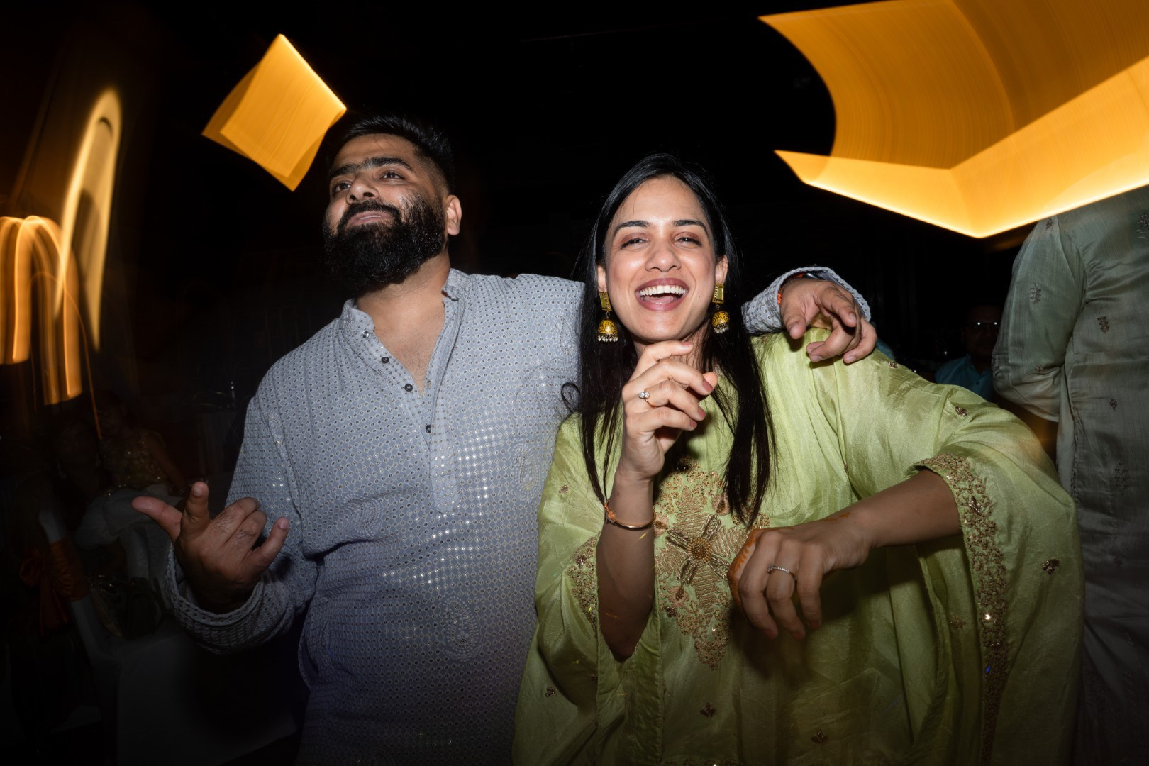 Hands in the Air: Chiranjeev & Niharika at Hyatt Centric Hebbal. Truly Yours | Documentary Wedding Photography & Films | Sharath Padaru, Bangalore