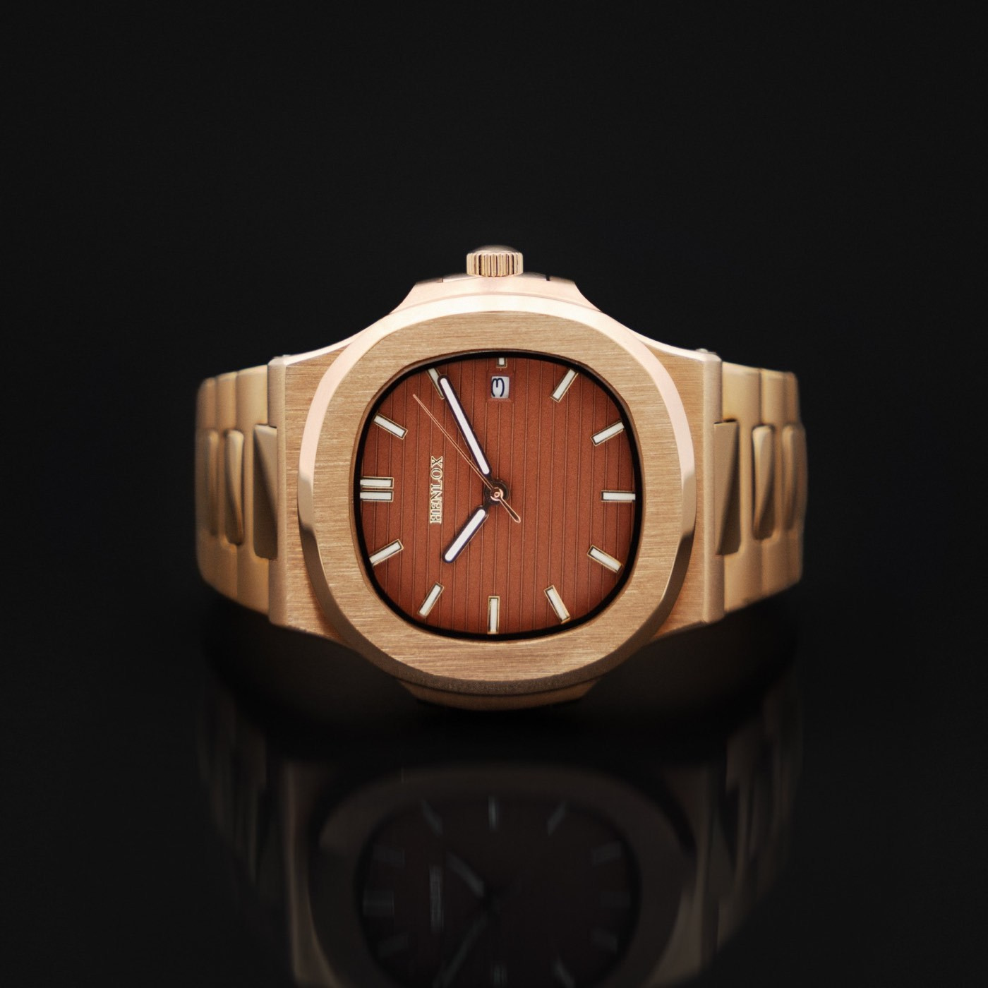 Luxury watch photographed on a dark background for a commercial brand campaign