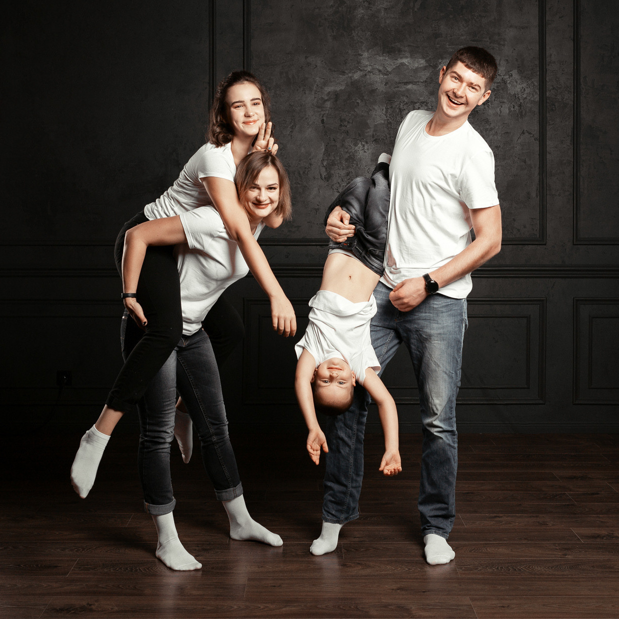 Family portrait session with studio lighting dark background Dimitri Studio Spruce Grove Edmonton