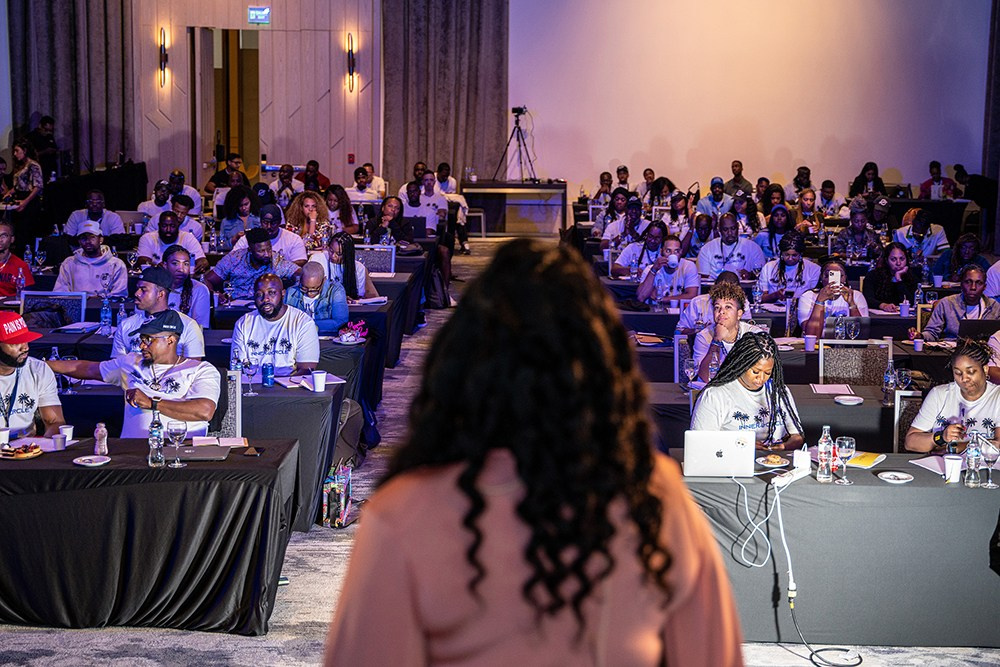 Presenter sharing strategic insights while the audience listens carefully.