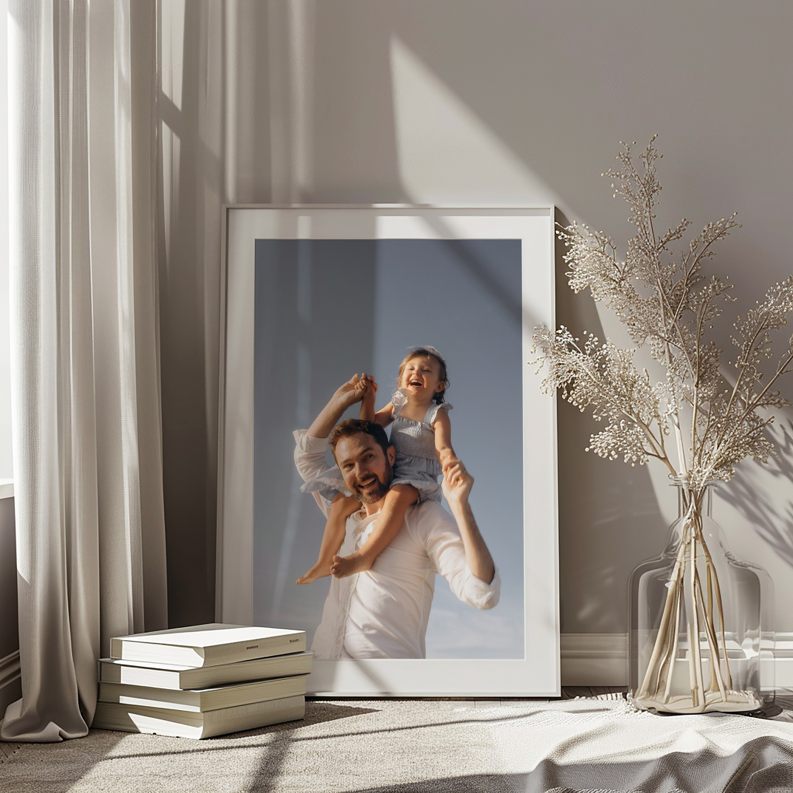Framed family portrait of a father and daughter in a sunlit room