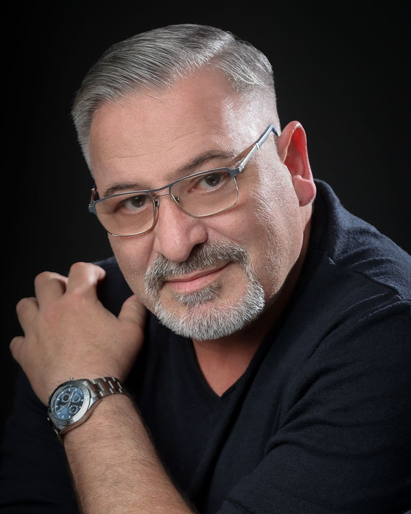 Portrait of Gershon Abramashvili, documentary wedding photographer based in Israel