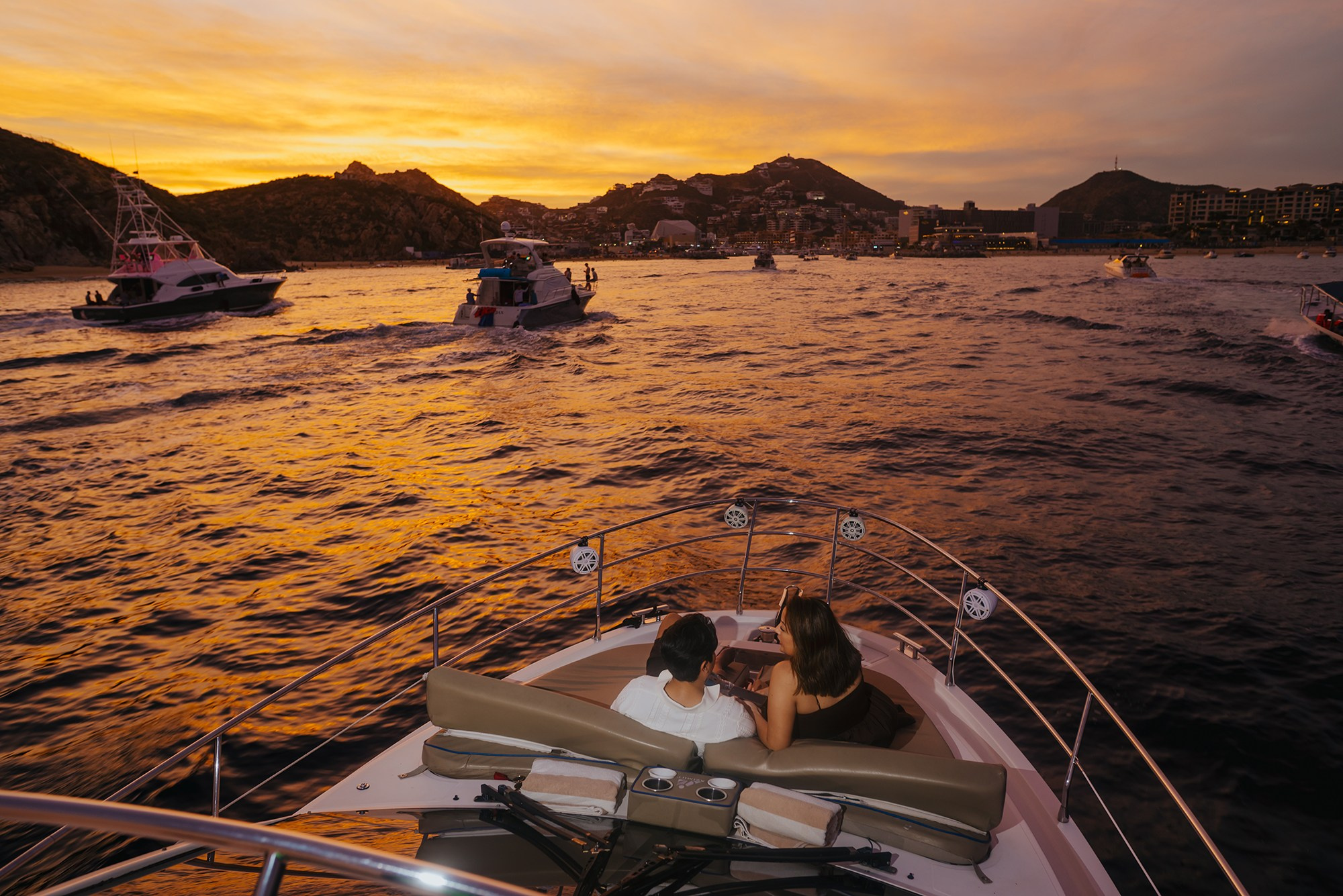 Sunset over the ocean after a yacht proposal in Cabo San Lucas