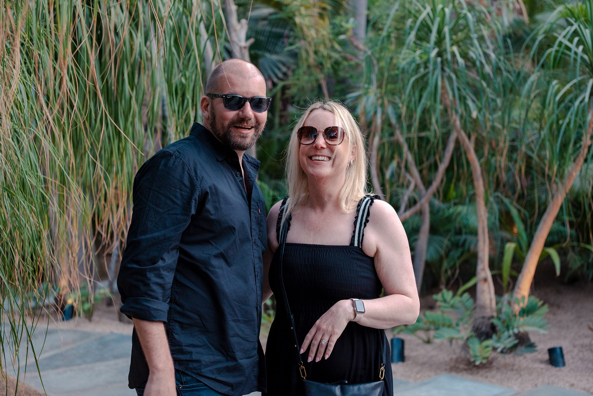 Sean and Lisa newly engaged smiling at Acre Restaurant San José del Cabo Los Cabos proposal photography
