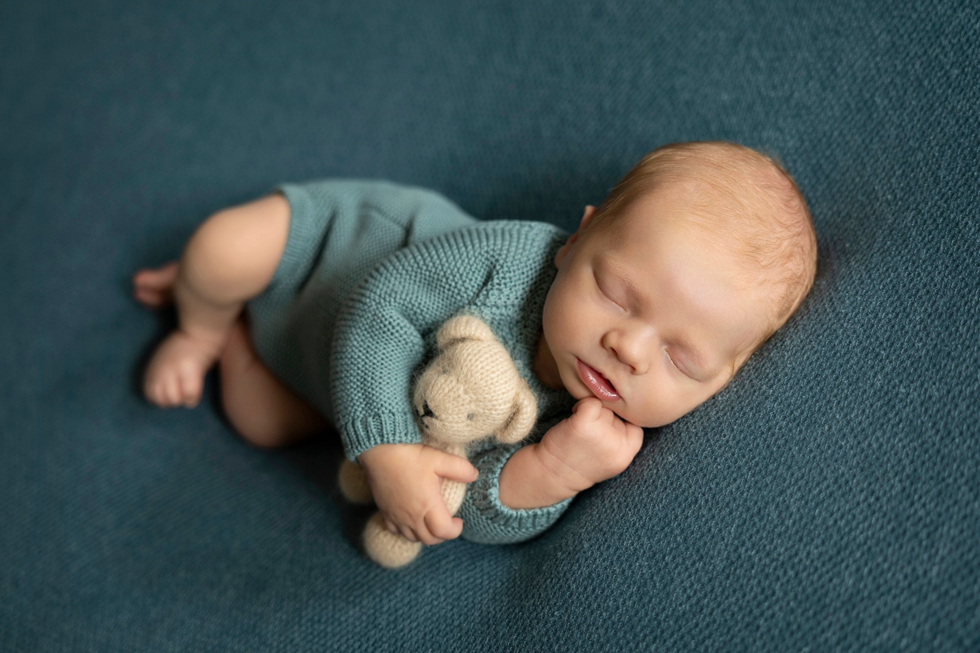 cute baby portrait in teal colors