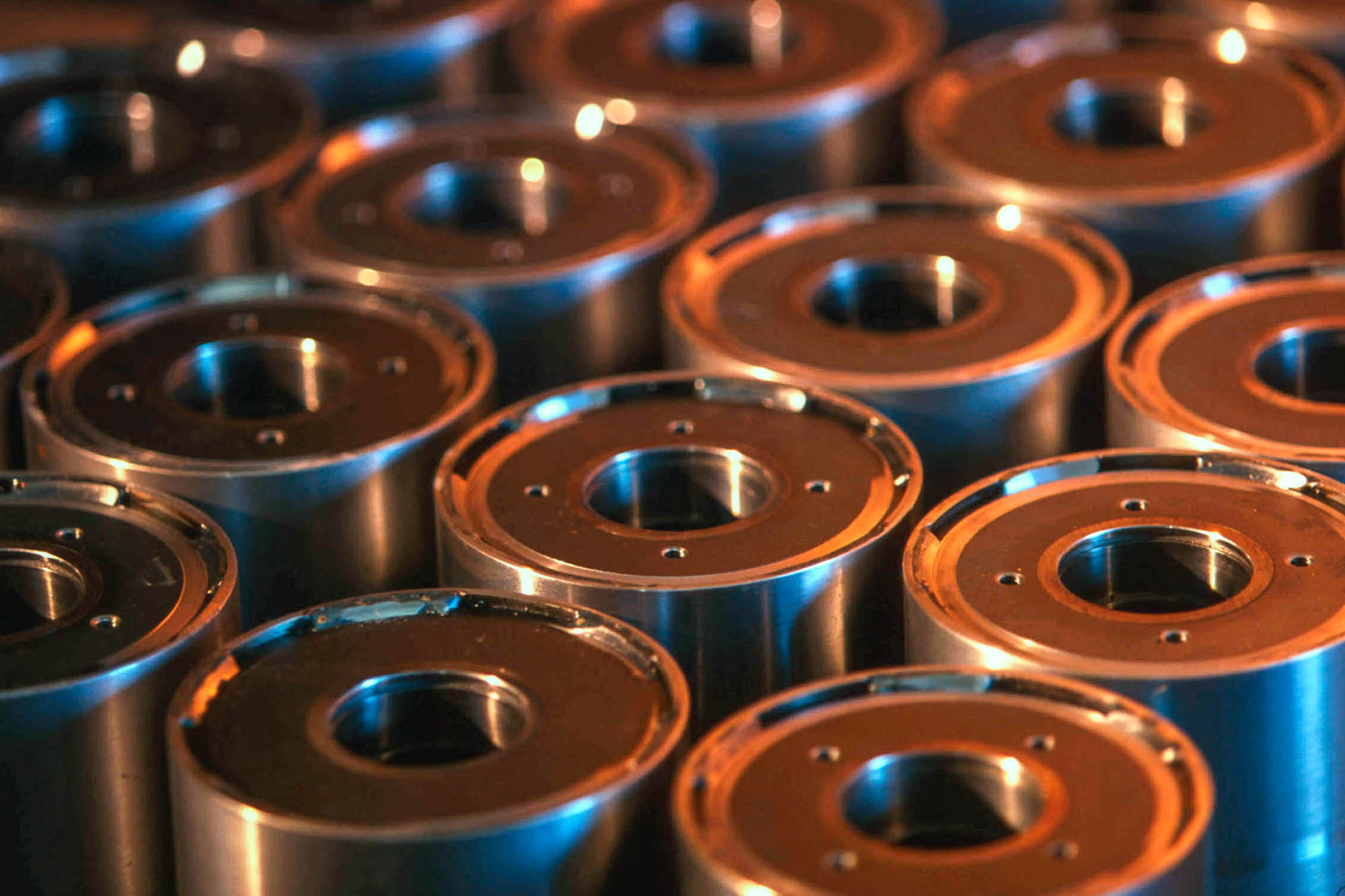 Stock photo of rolls of fabricated metal awaiting transport.