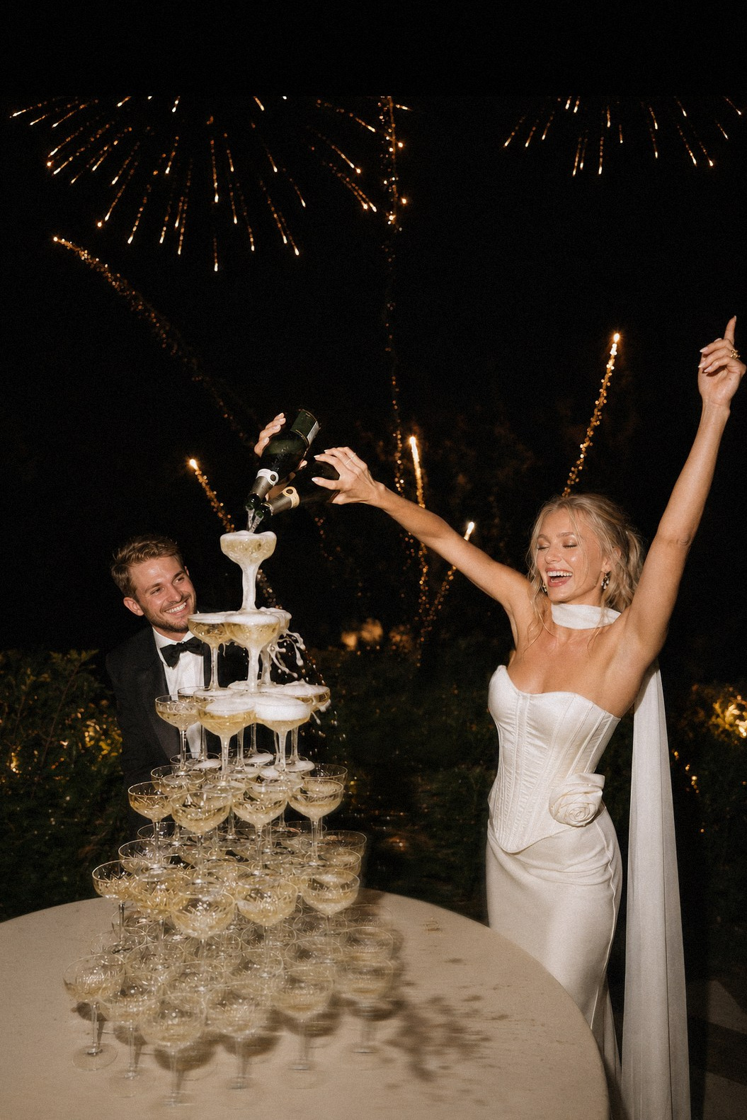 Romantic champagne tower moment at an elegant destination wedding celebration in Bodrum, Turkey