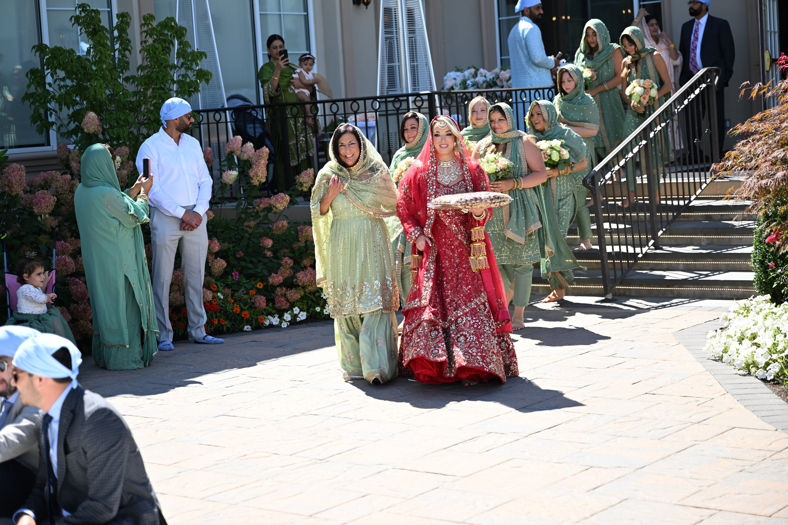 a group of people walking down a street