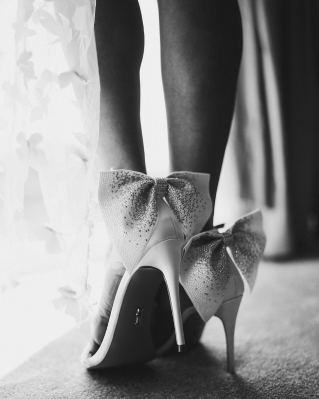 Boudoir detail shot West Midlands, elegant black and white heels and stockings