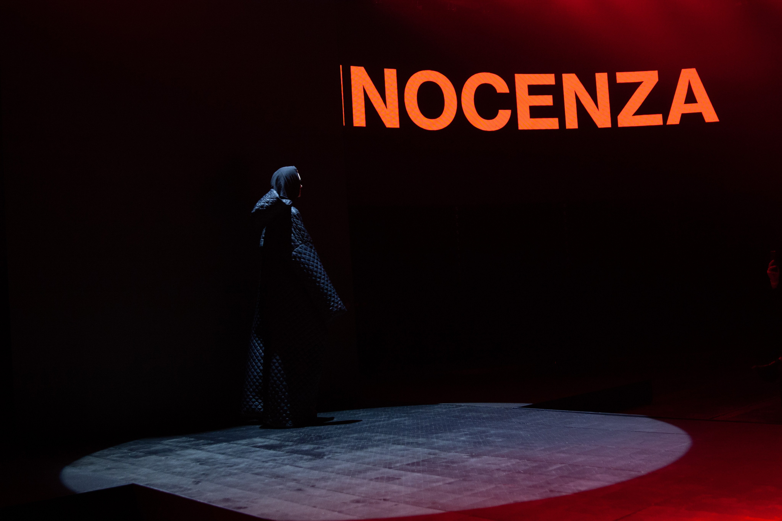 A model walking the runway at Rome Fashion Week, captured by Elizaveta Razumova.